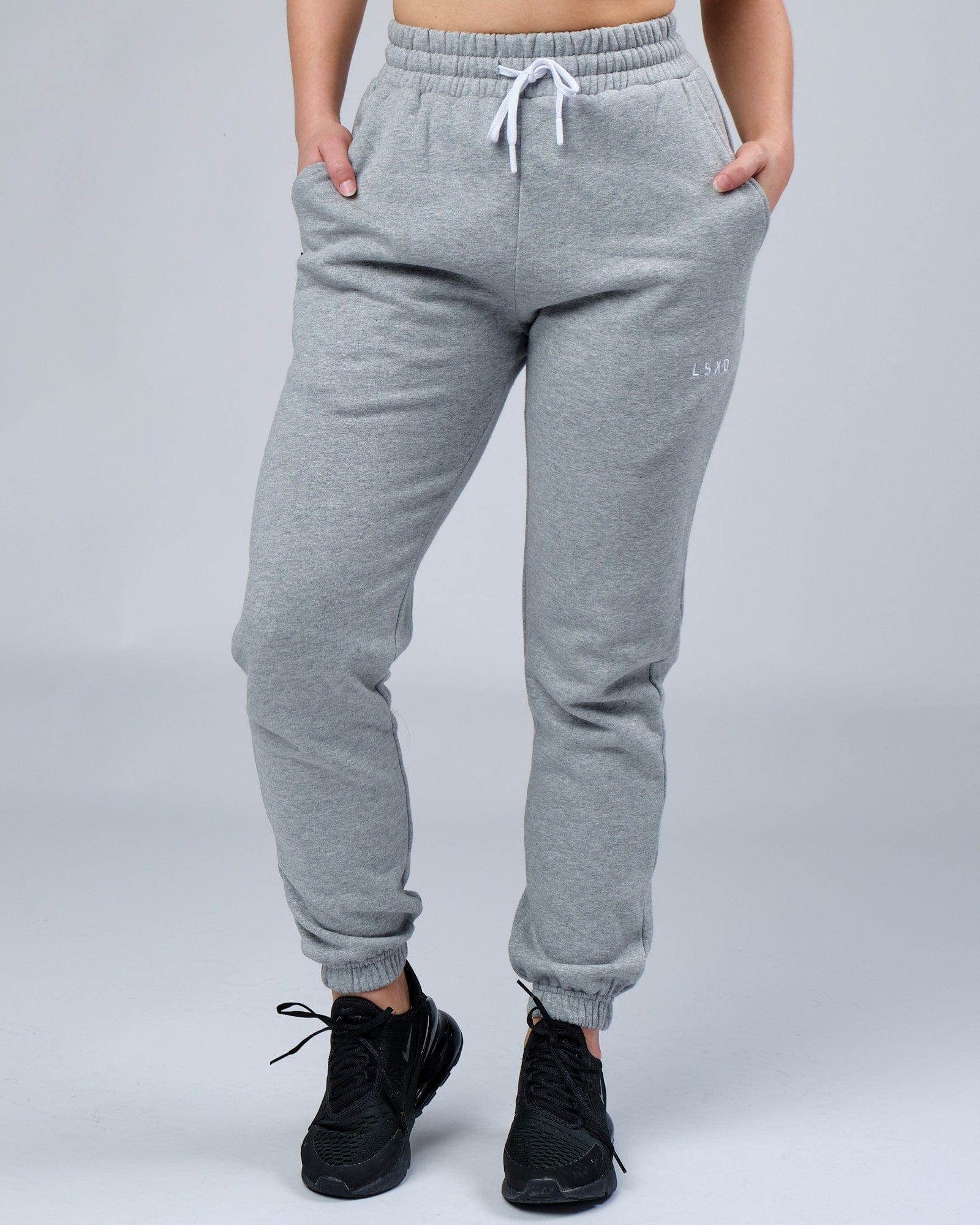 Model wearing Unisex Ready Track Pant - Lt Grey Marl