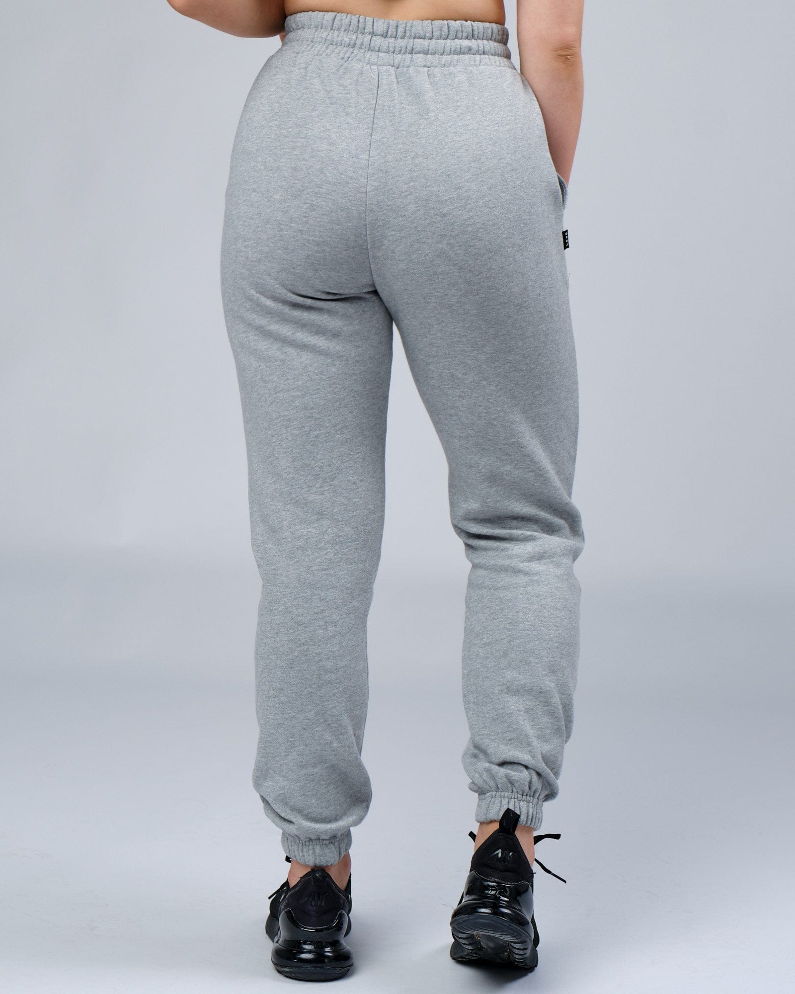 Model wearing Unisex Ready Track Pant - Lt Grey Marl