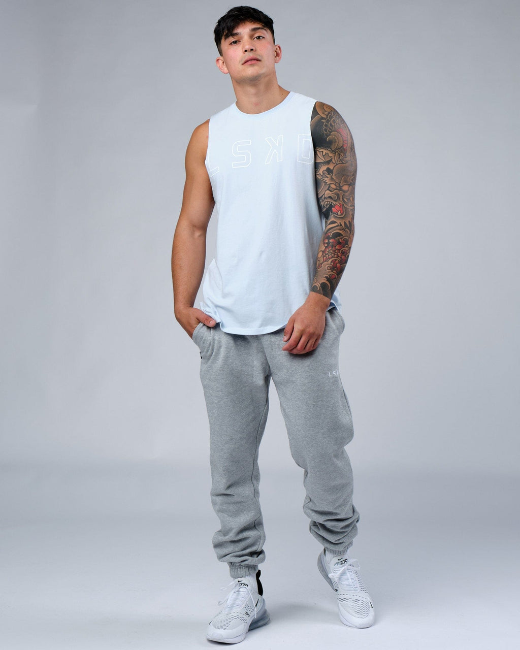 Model wearing Ready Track Pant - Lt Grey Marl