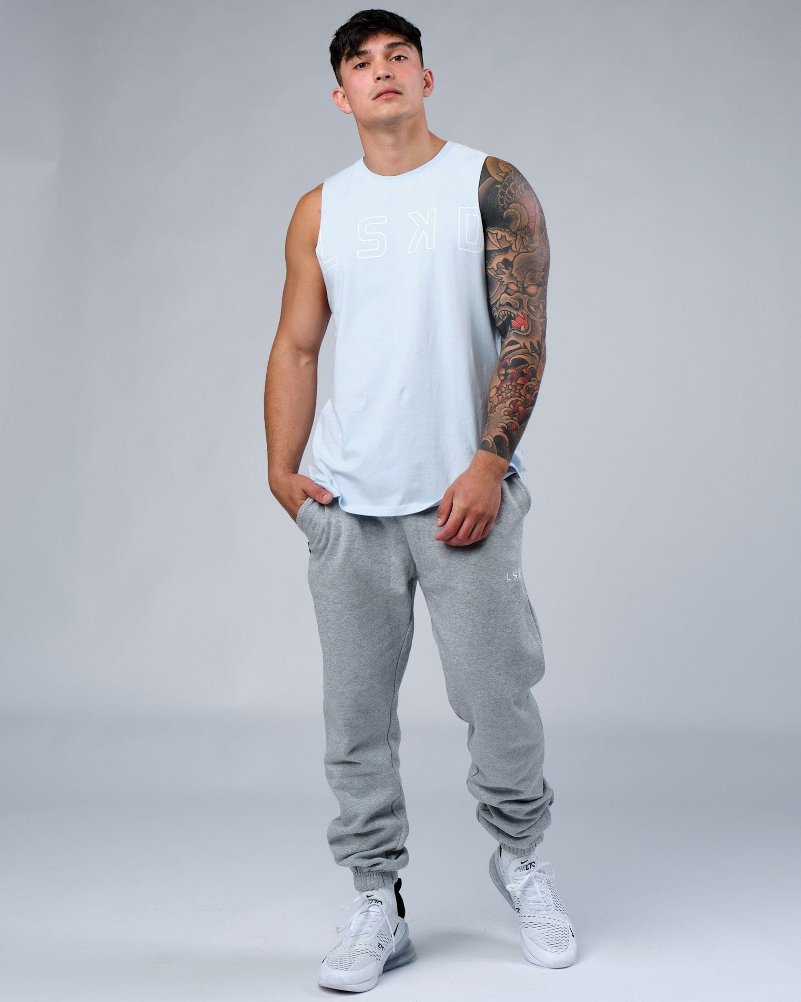 Model wearing Ready Track Pant - Lt Grey Marl