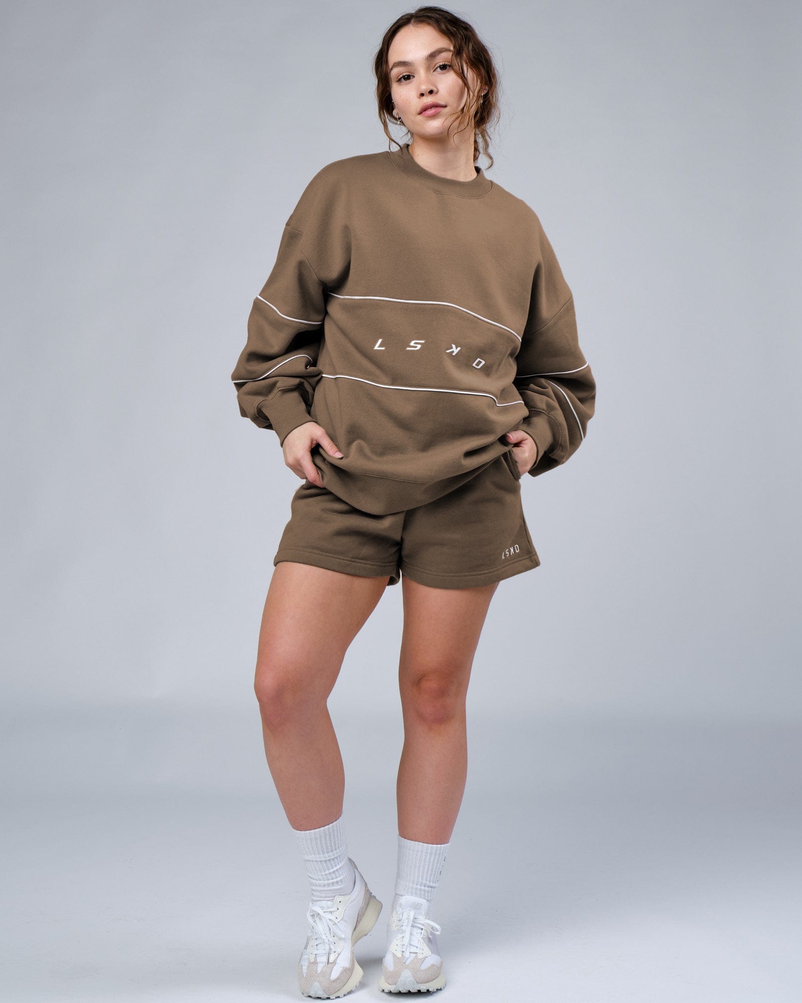 Model wearing Ready Track Short - Fossil