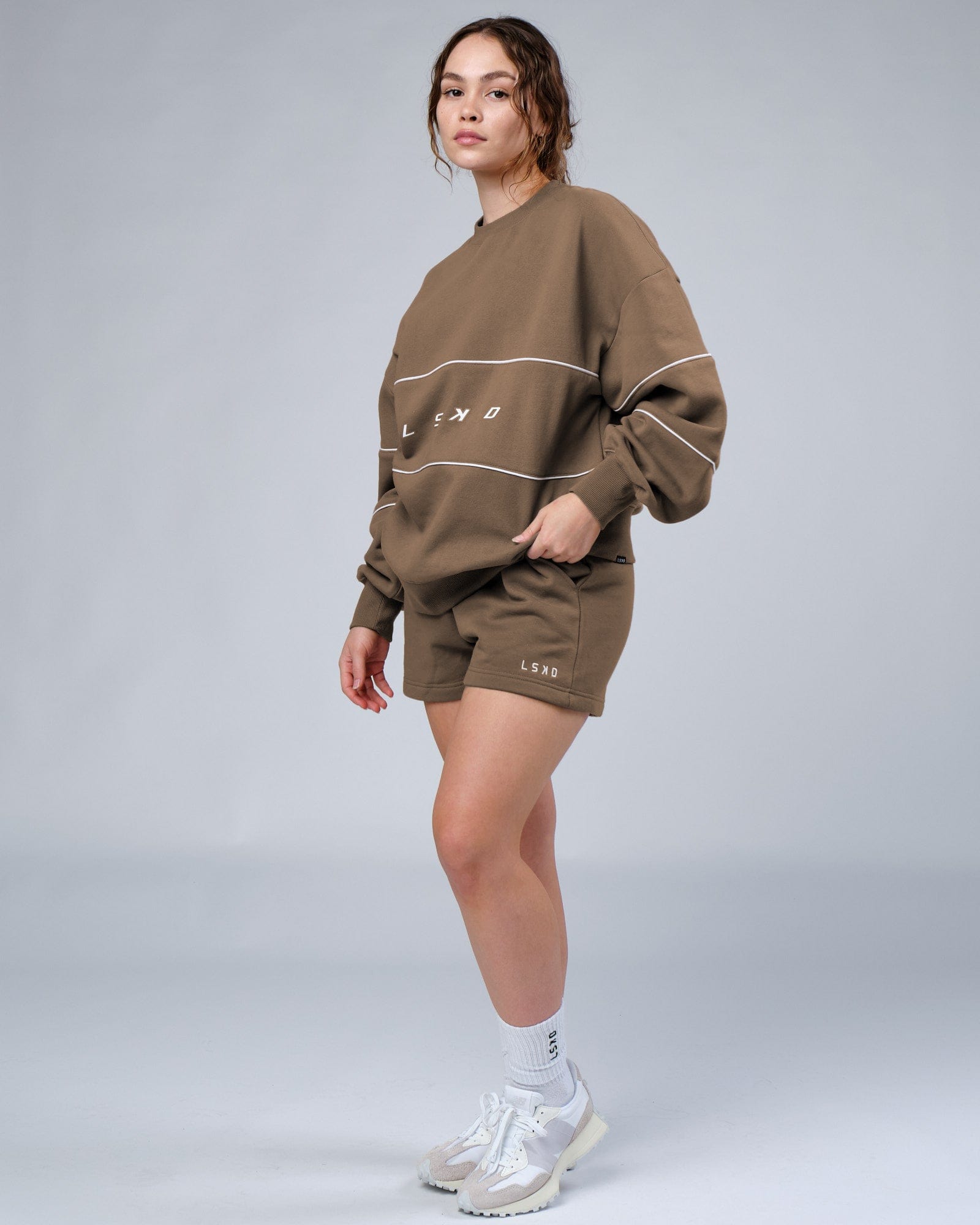 Model wearing Ready Track Short - Fossil