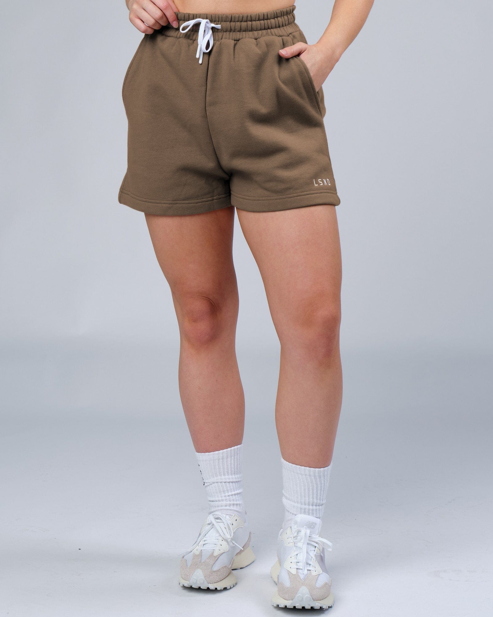 Model wearing Ready Track Short - Fossil