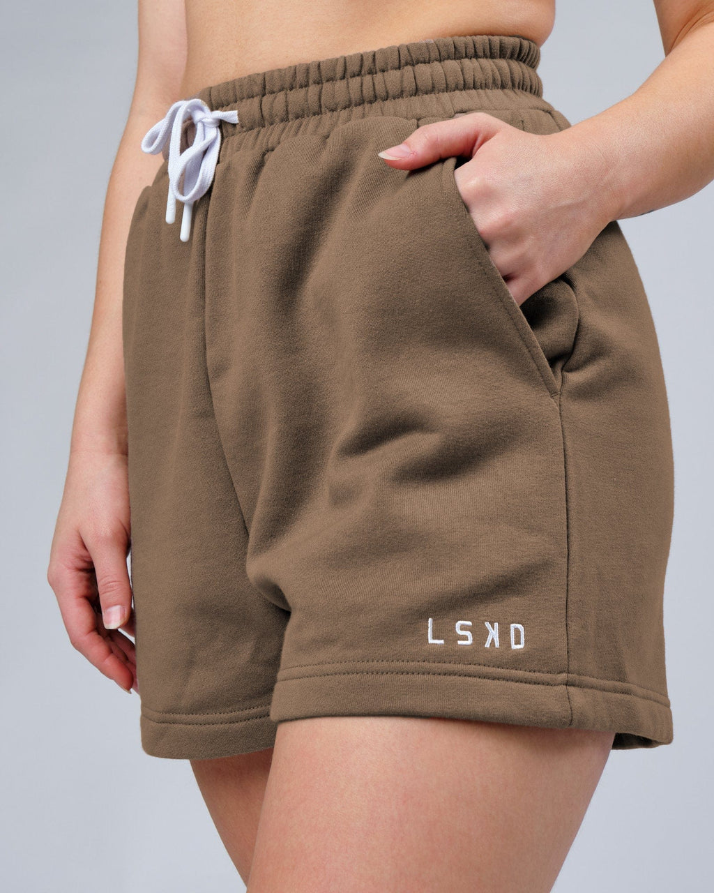 Model wearing Ready Track Short - Fossil