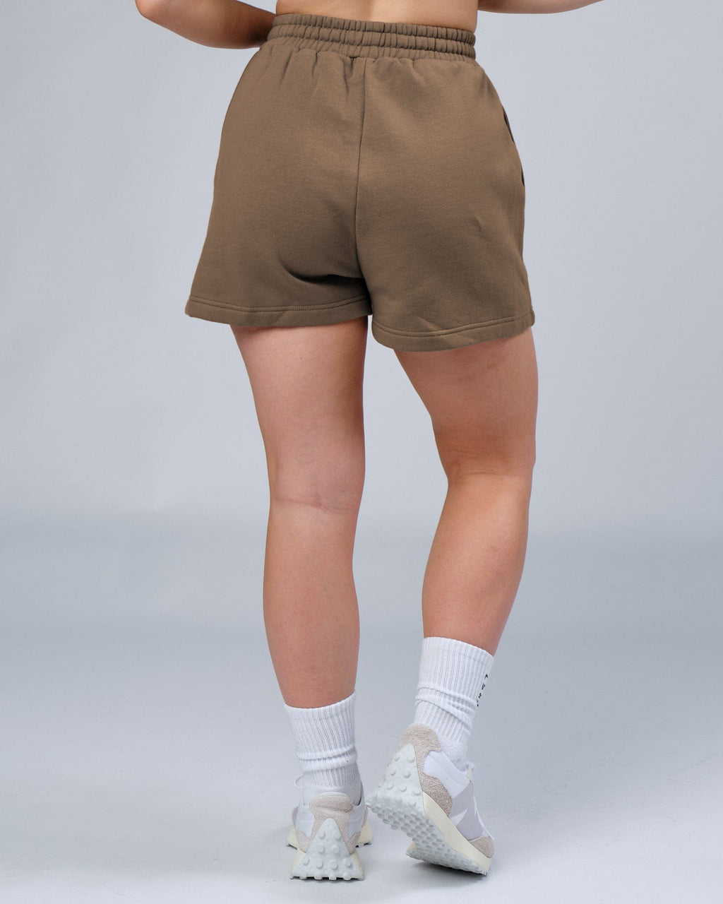 Model wearing Ready Track Short - Fossil