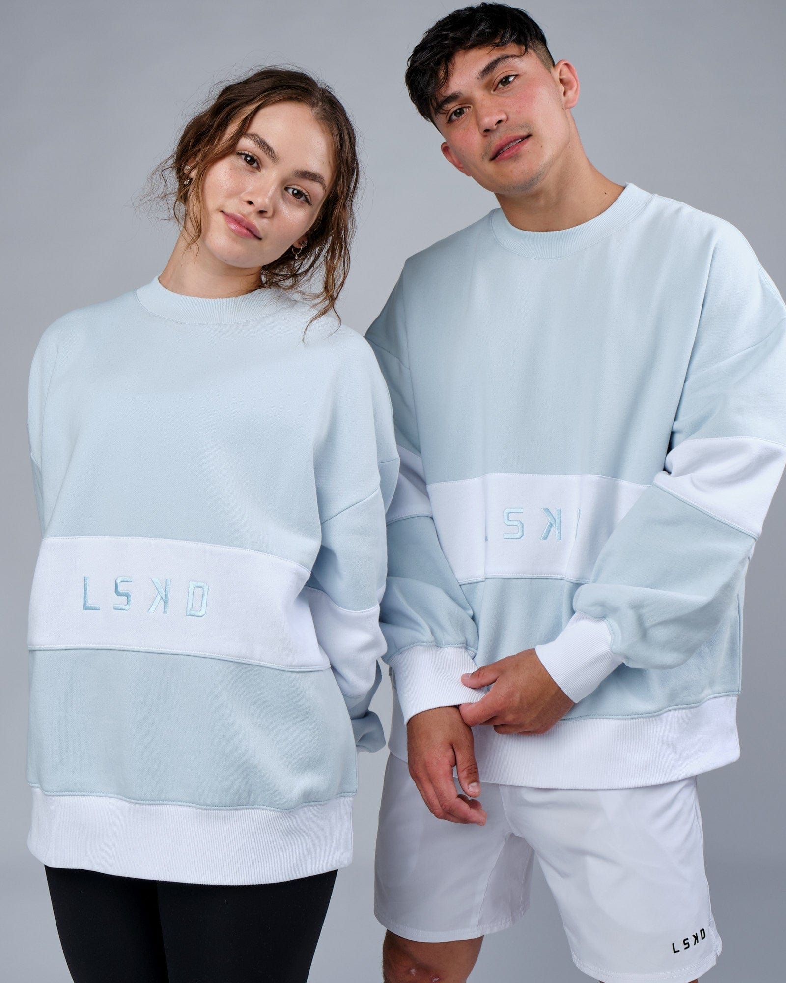 Model wearing Unisex Extra Time Sweater Oversize - Ballad Blue