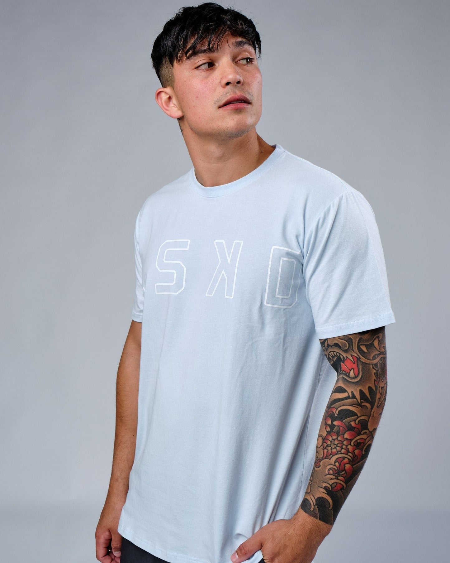 Model wearing Expand FLXCotton Tee - Sky Blue