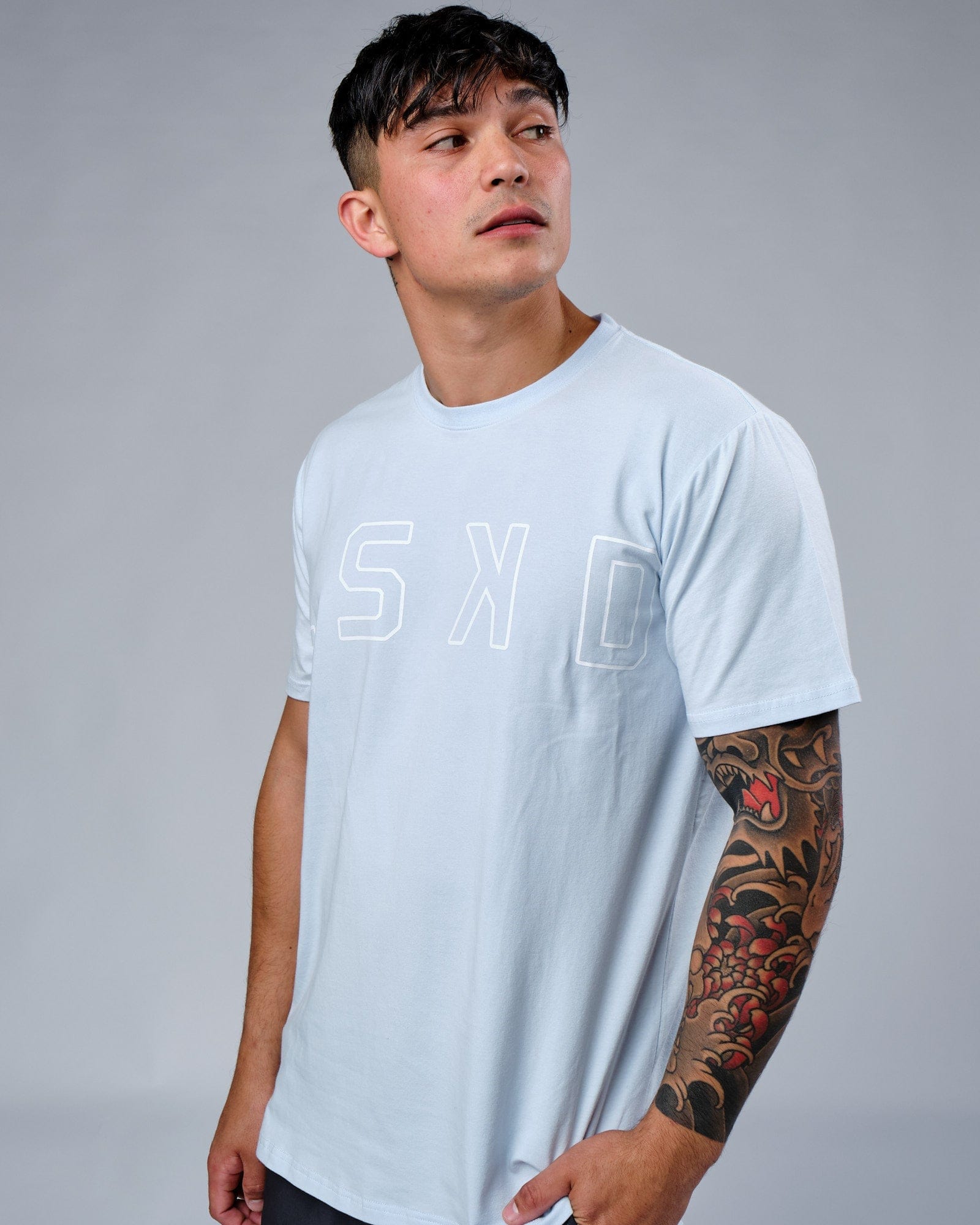 Model wearing Expand FLXCotton Tee - Sky Blue