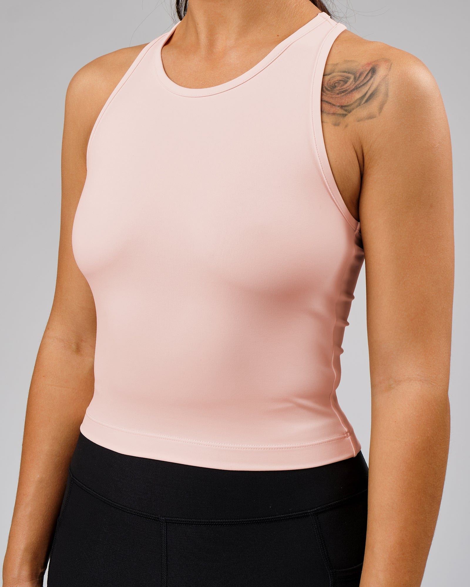 Model wearing Flow Performance Tank - Pink