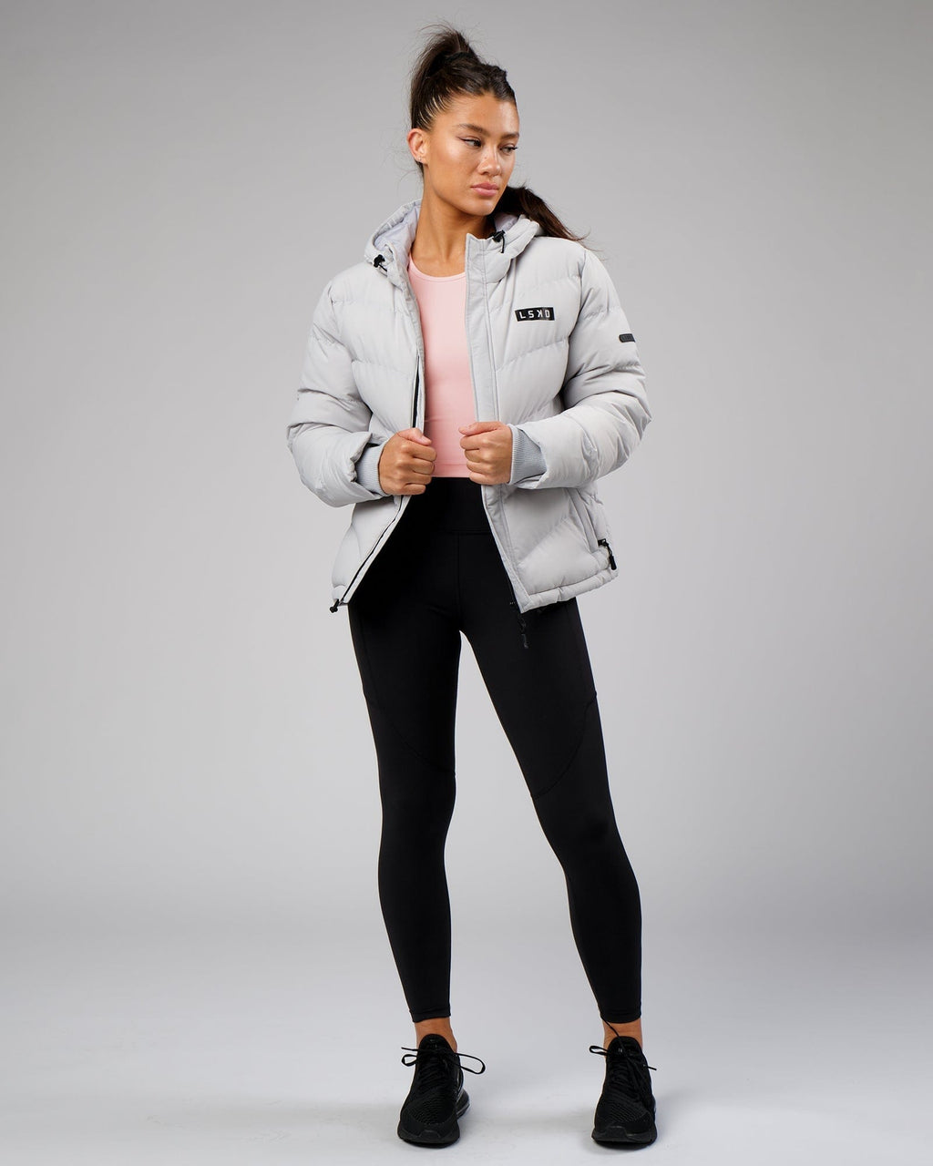 Model wearing Flow Performance Tank - Pink