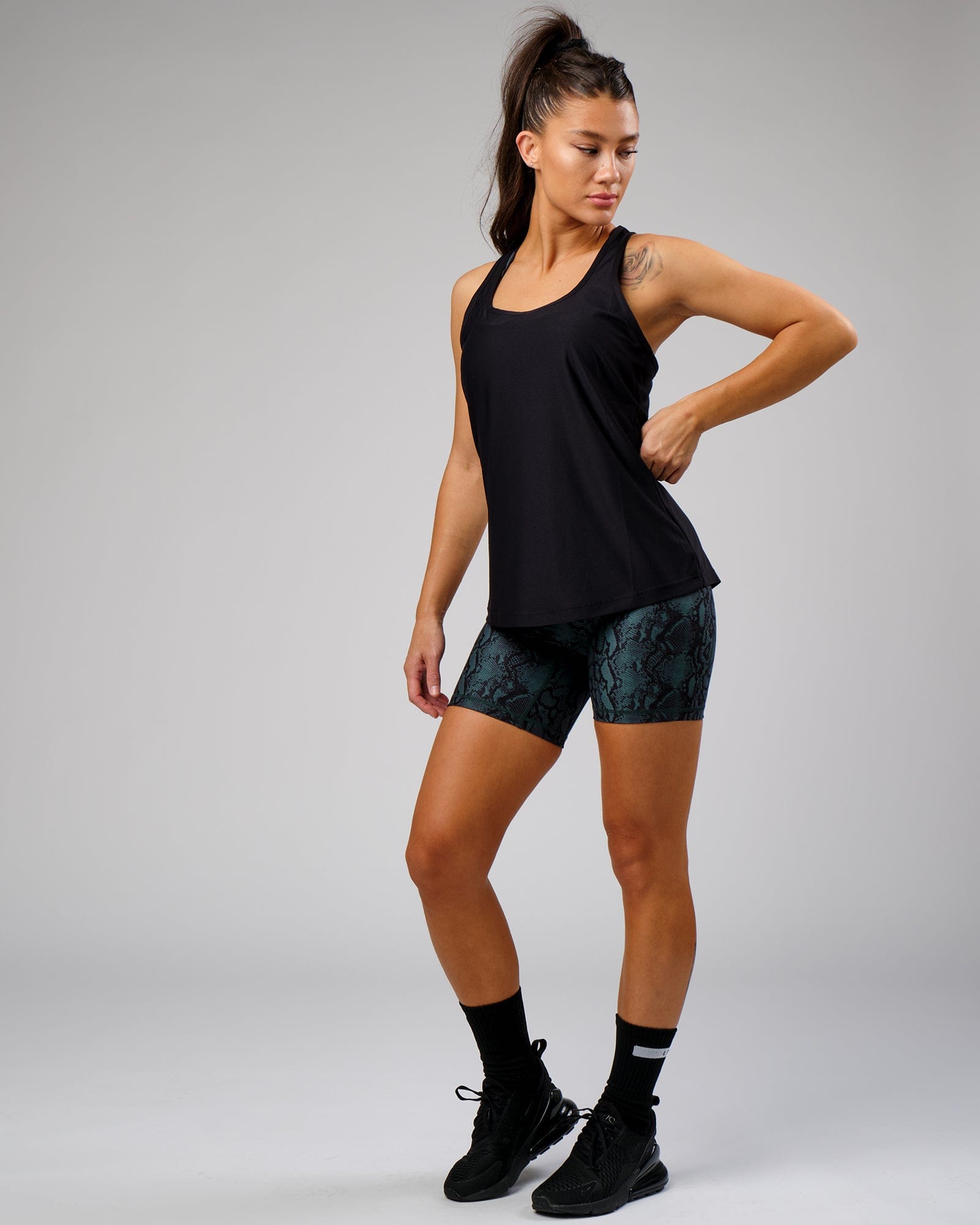 Model wearing Freedom Performance Tank - Black