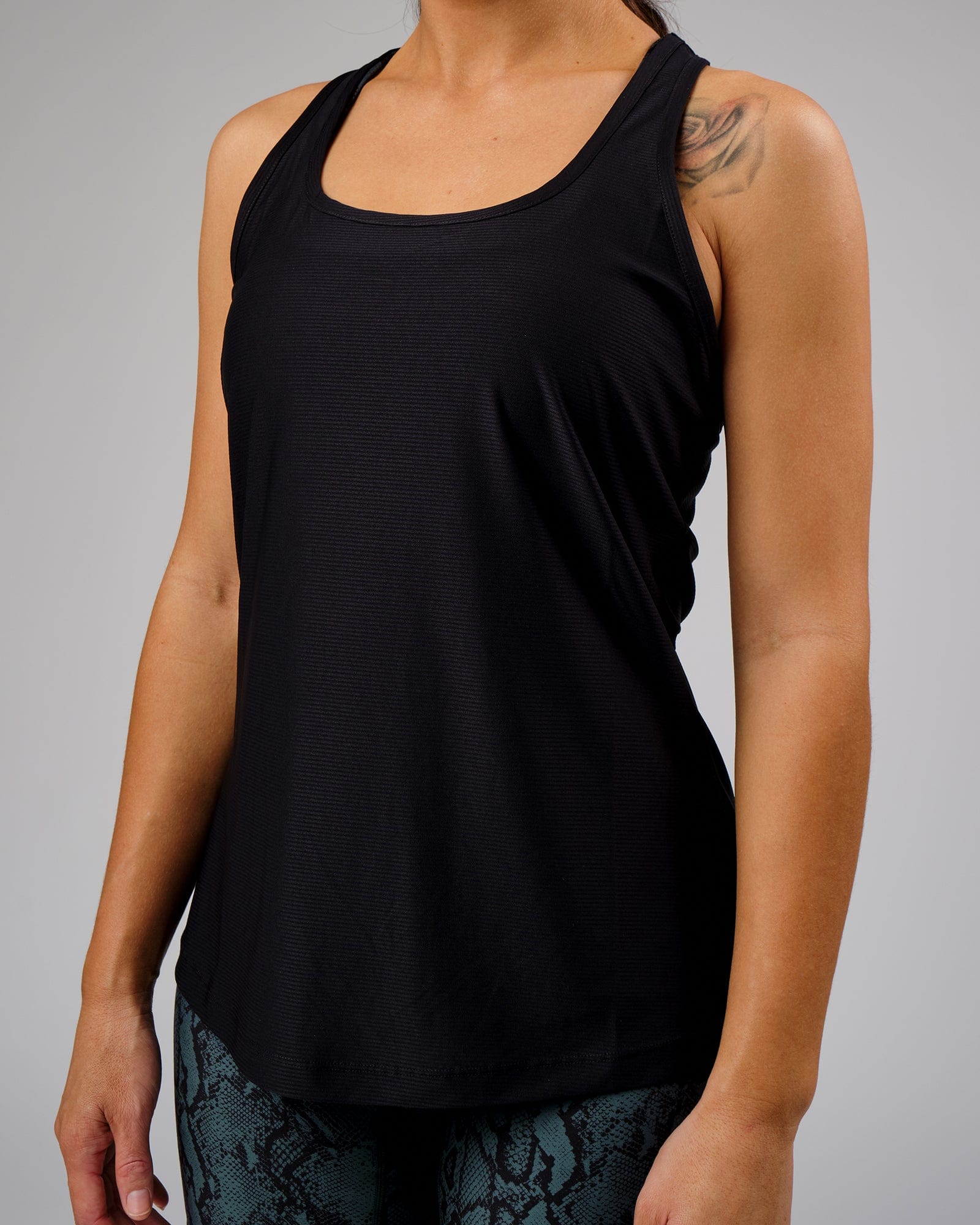 Model wearing Freedom Performance Tank - Black