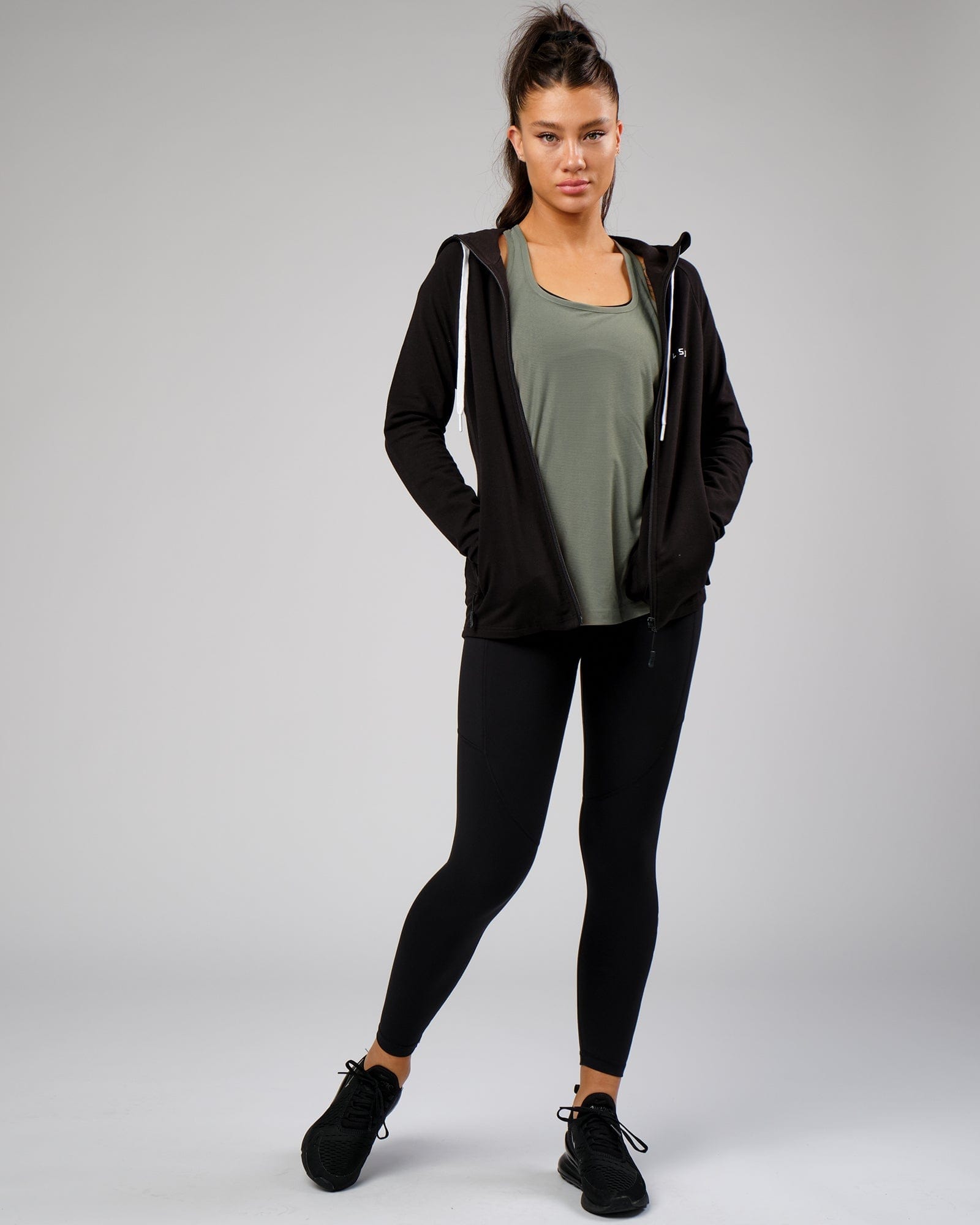 Model wearing Freedom Performance Tank - Dusty Olive