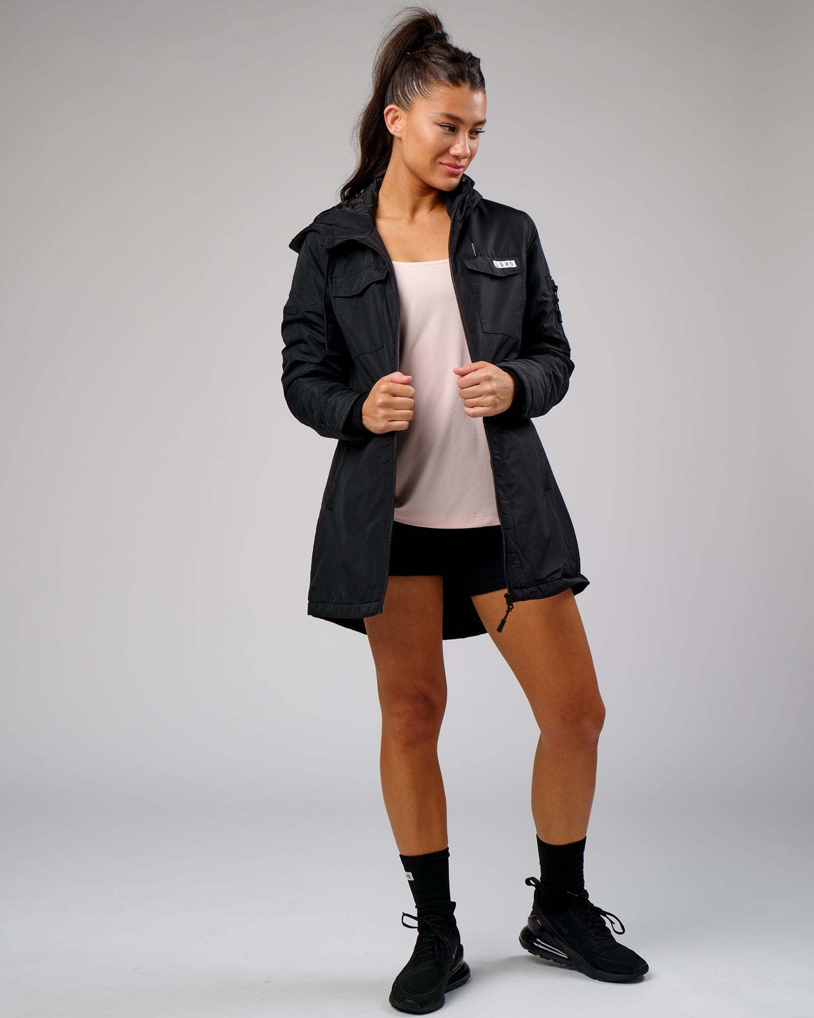 Model wearing Freedom Performance Tank - Pink