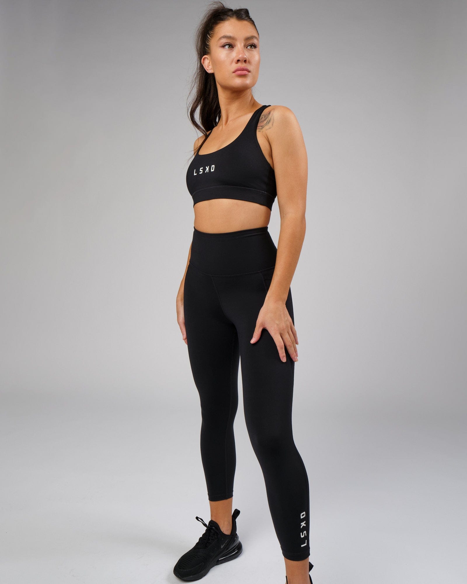 Model wearing Flux Full Length Tight - Black