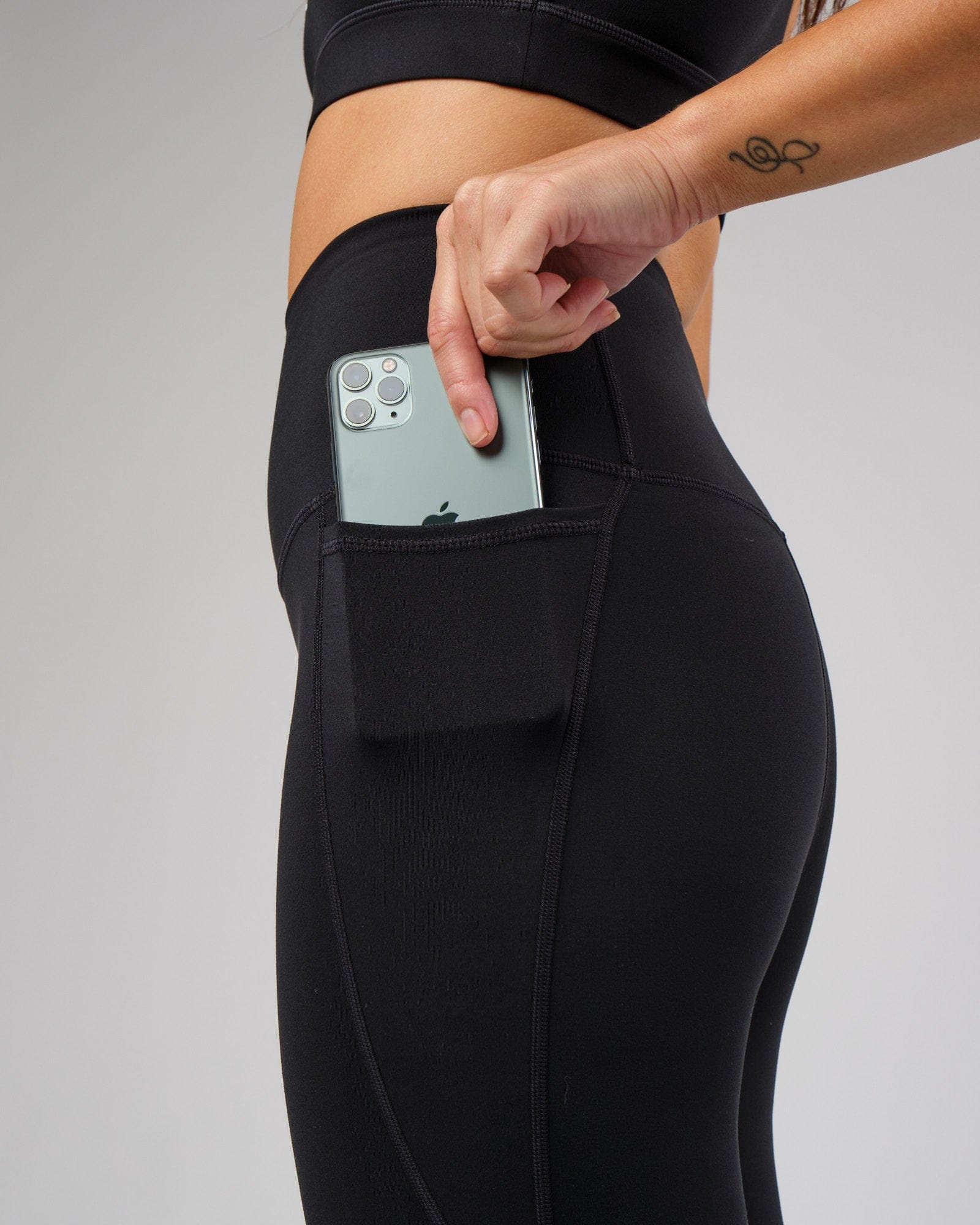 Model wearing Flux Full Length Tight - Black