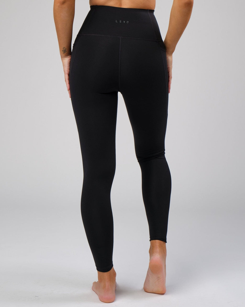 Model wearing Flux Full Length Tight - Black