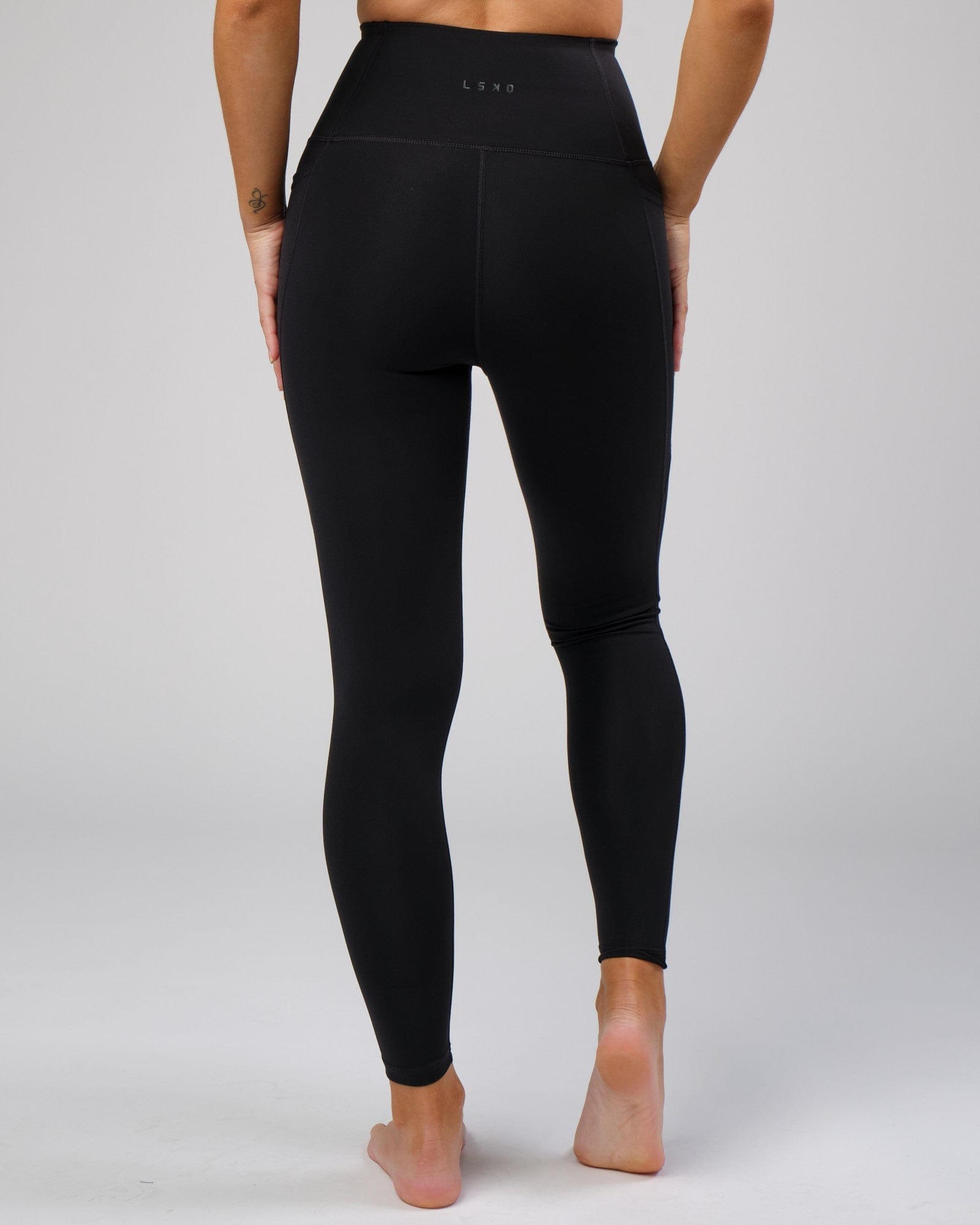 Model wearing Flux Full Length Tight - Black