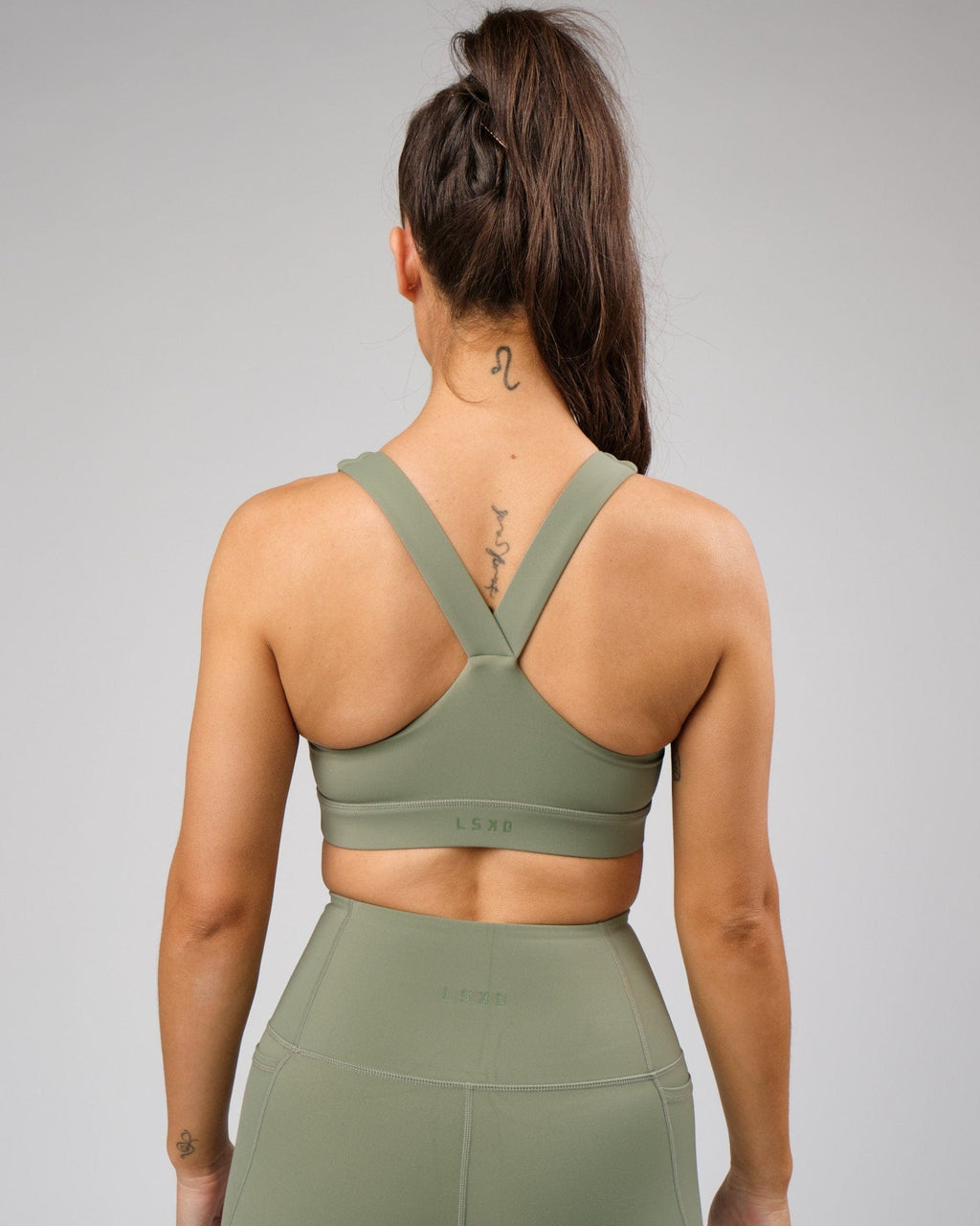 Model wearing Rep Recycled Sports Bra - Sea Spray