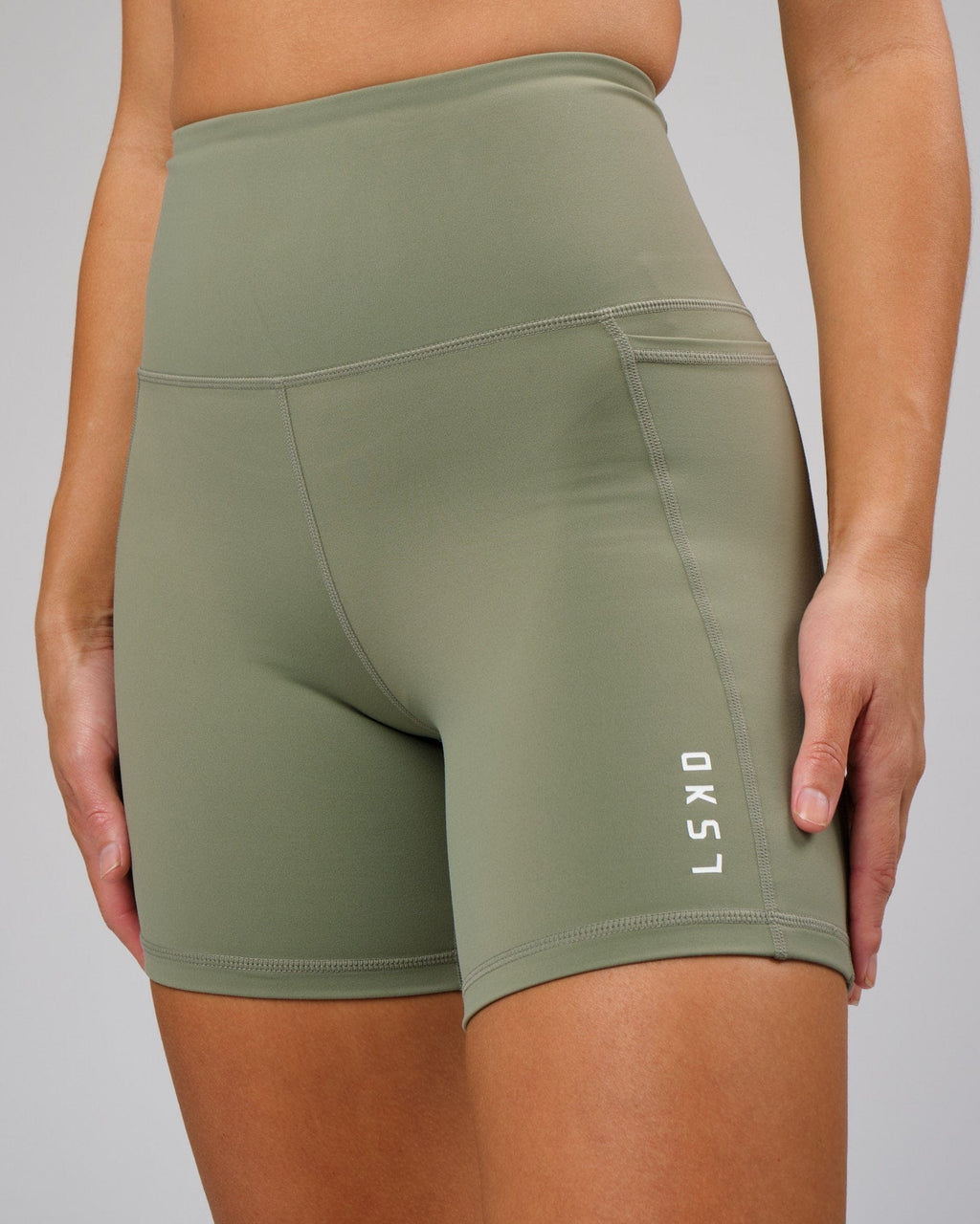 Model wearing Flux Recycled Mid Short Tight - Sea Spray