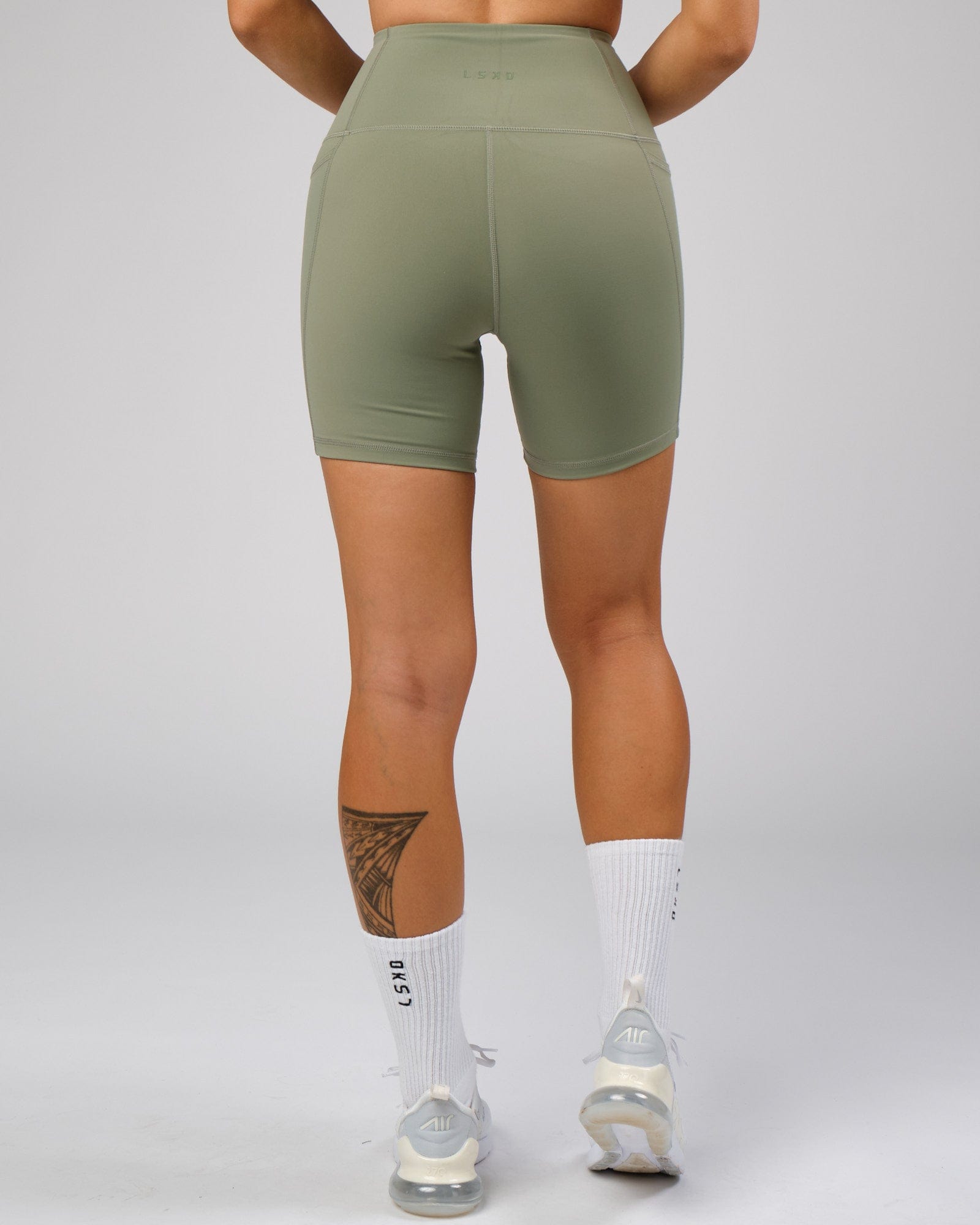 Model wearing Flux Recycled Mid Short Tight - Sea Spray