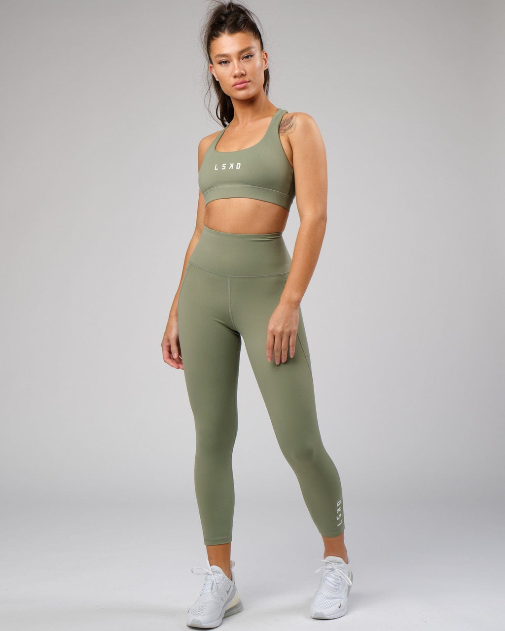 Model wearing Flux Recycled 7/8 Length Tight - Sea Spray