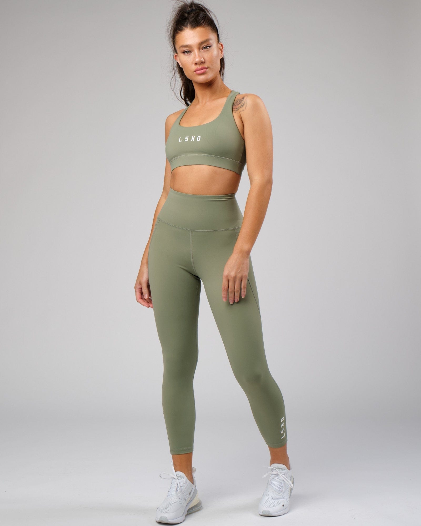 Model wearing Flux Recycled 7/8 Length Tight - Sea Spray