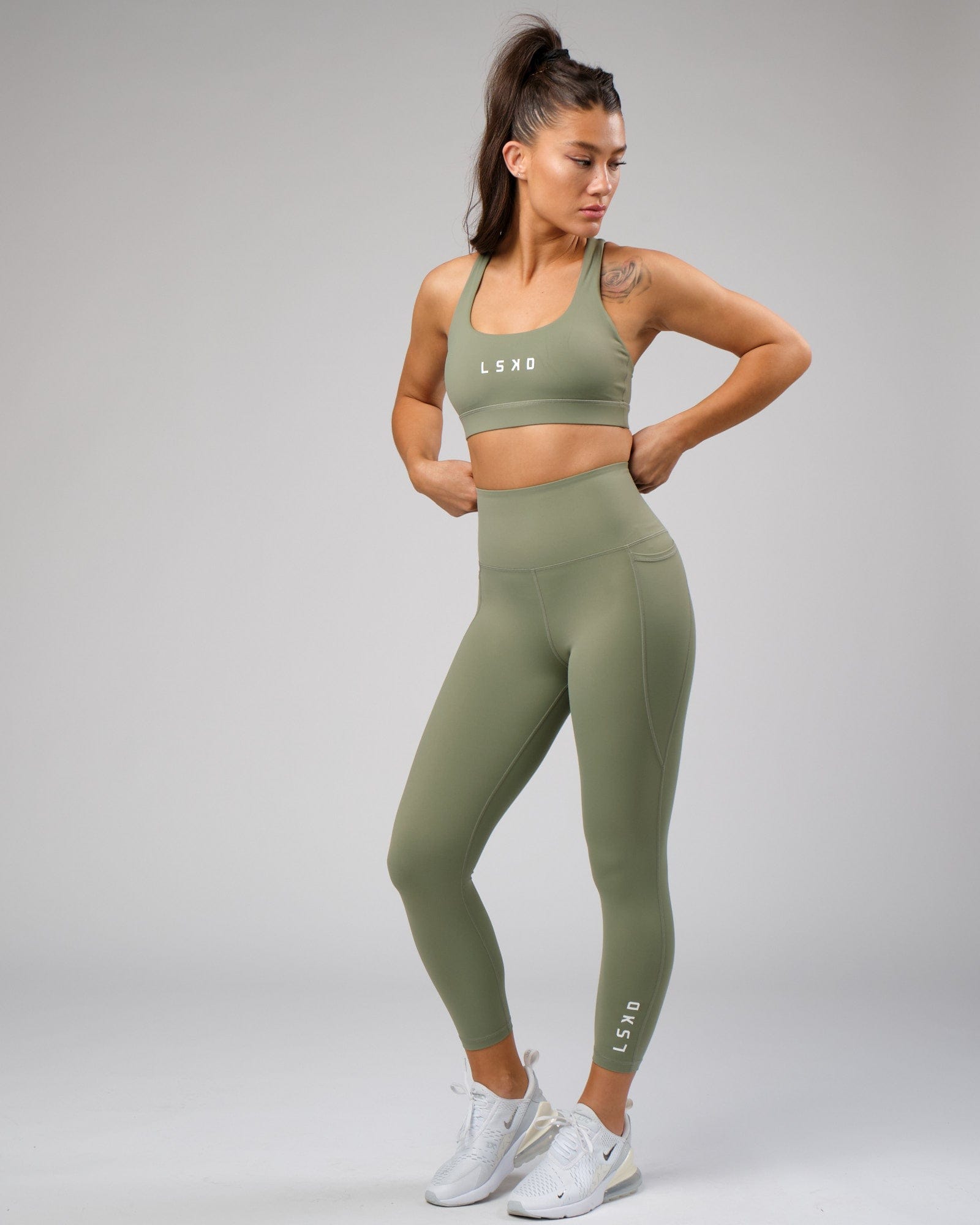 Model wearing Flux Recycled 7/8 Length Tight - Sea Spray