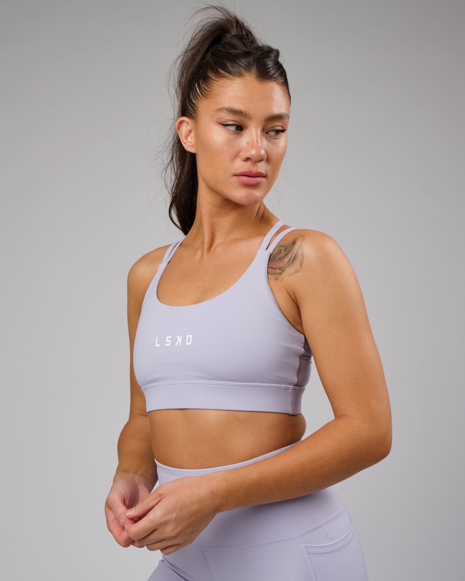 Model wearing Bridge Recycled Sports Bra - Cosmic Sky