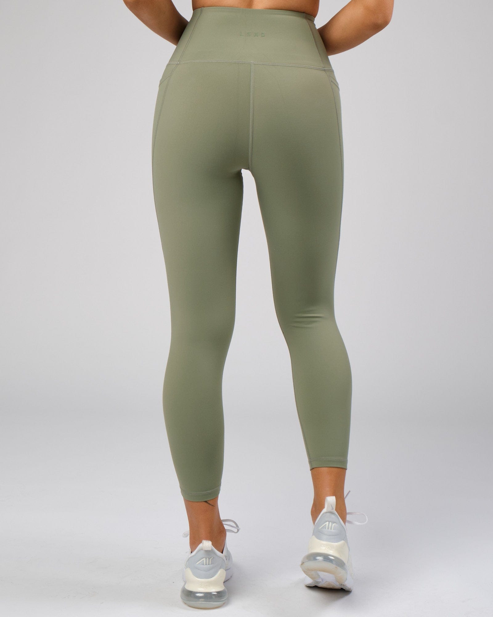 Model wearing Flux Recycled 7/8 Length Tight - Sea Spray