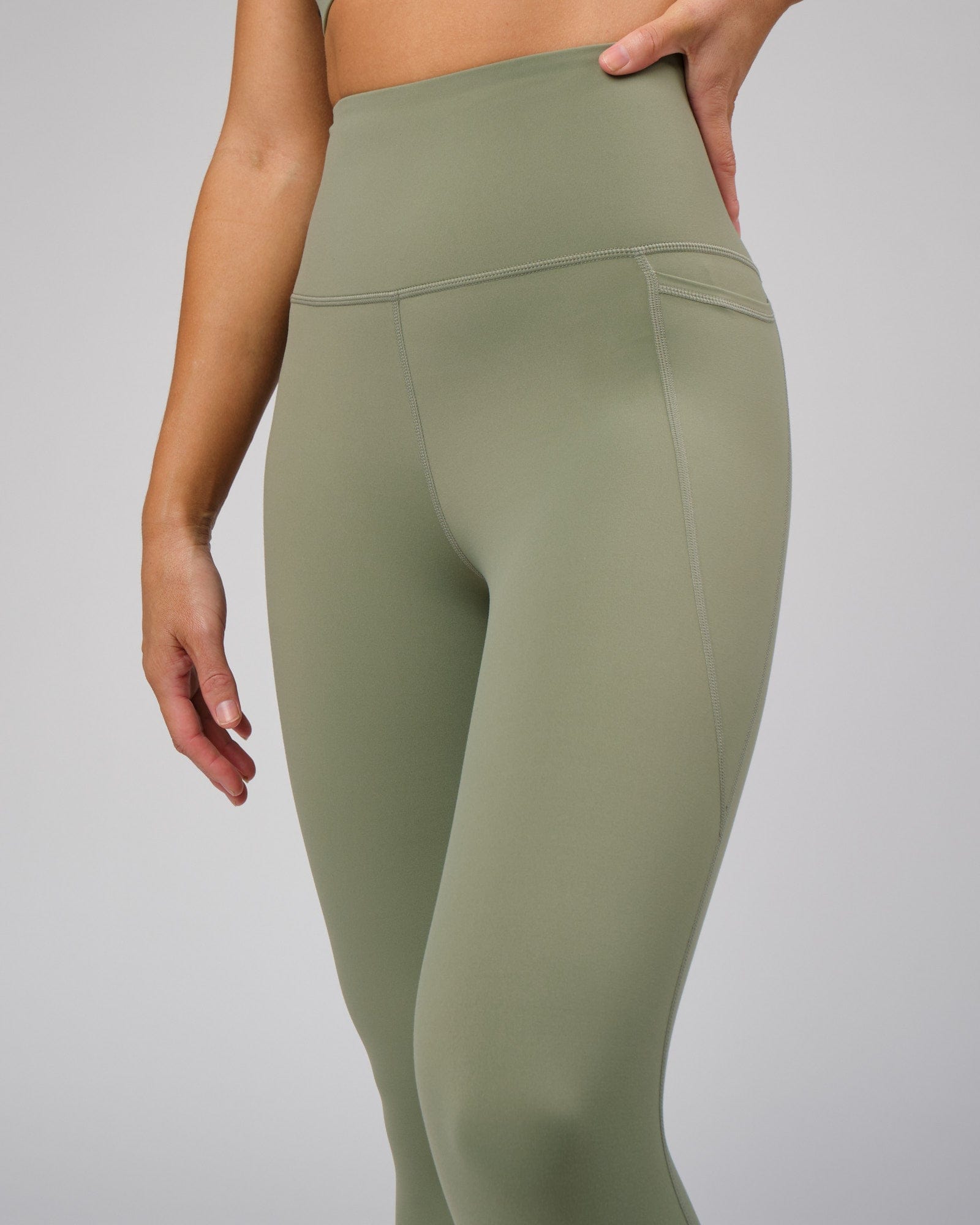 Model wearing Flux Recycled Full Length Tight - Sea Spray