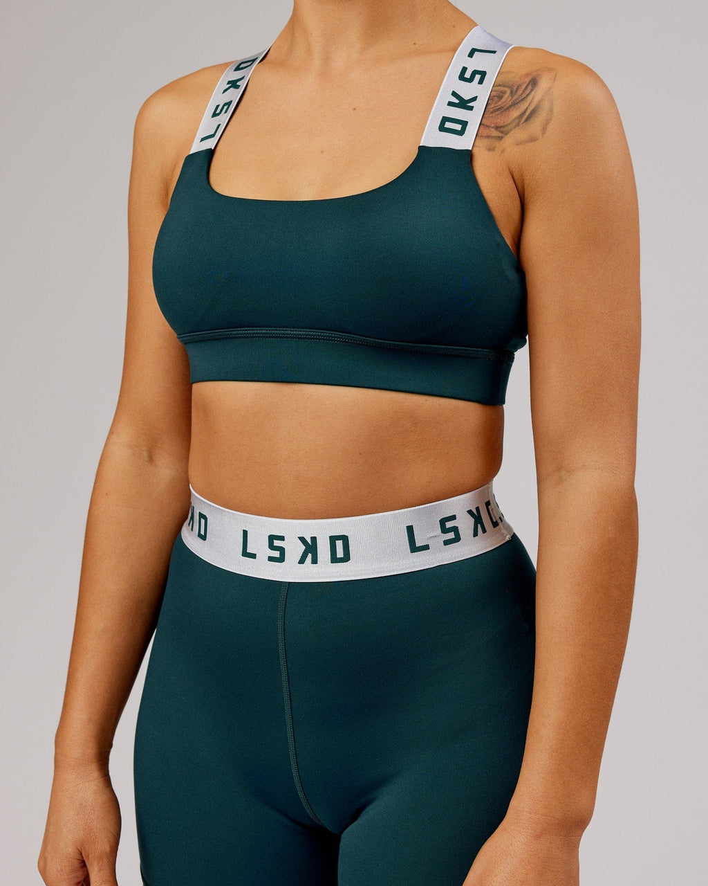 Model wearing Competition Sports Bra - Deep Teal