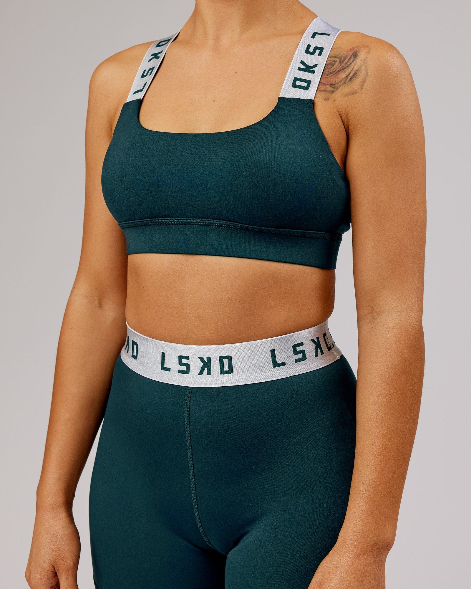 Model wearing Competition Sports Bra - Deep Teal
