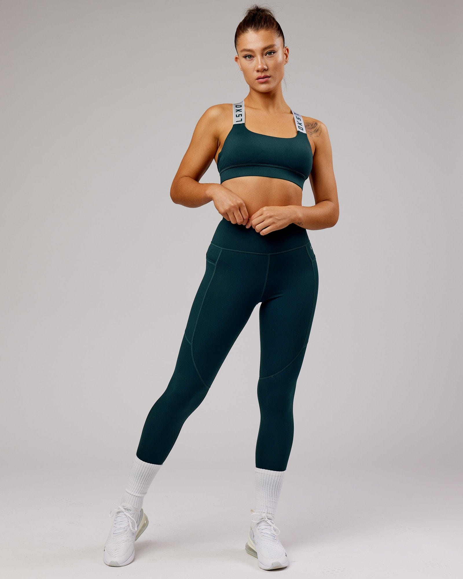 Model wearing Competition Sports Bra - Deep Teal