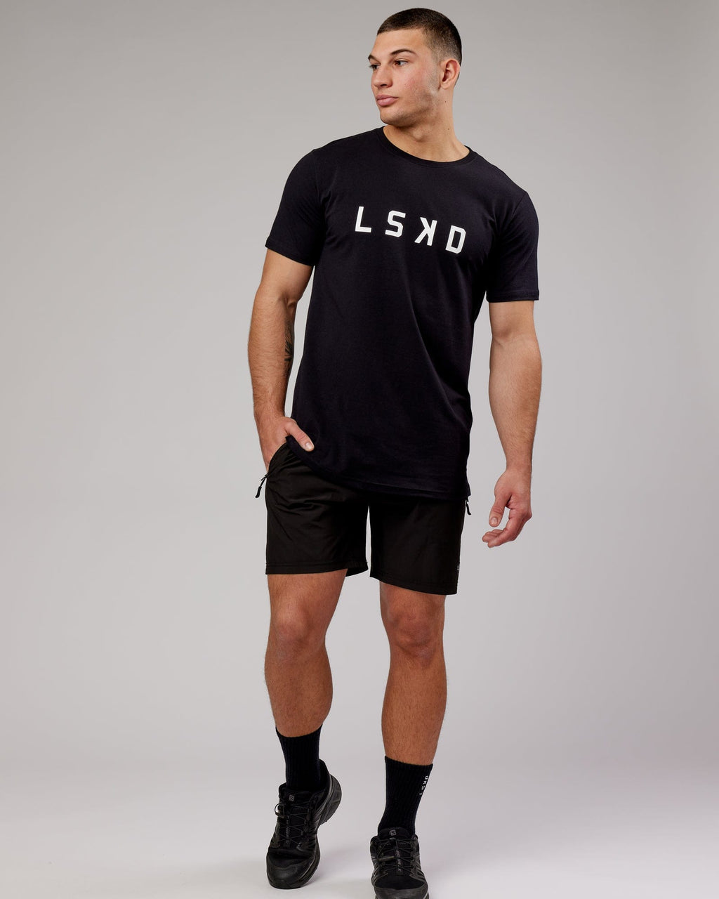 Model wearing Power FLXDRY Performance Tee - Black