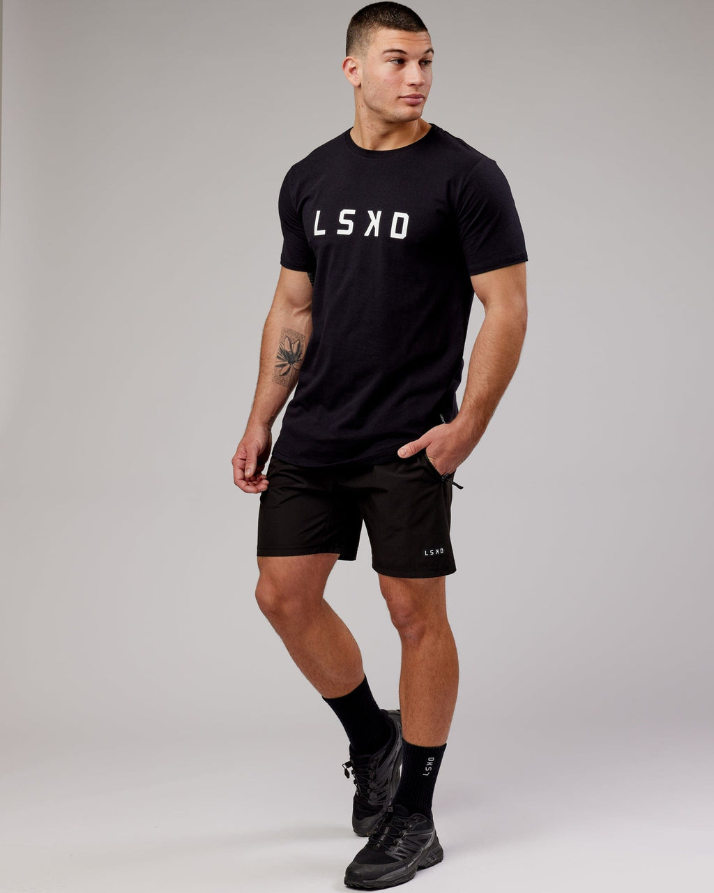 Model wearing Power FLXDRY Performance Tee - Black