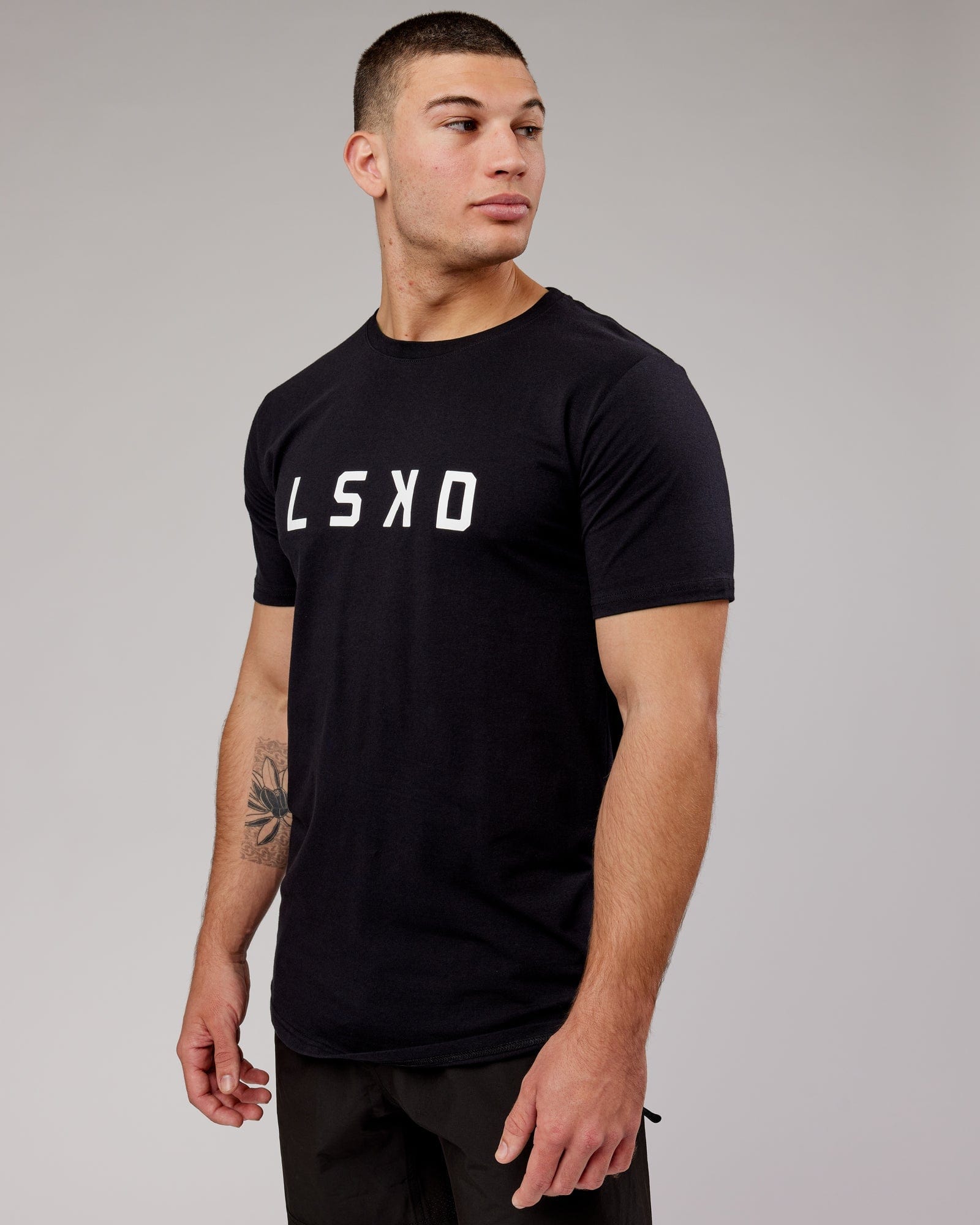 Model wearing Power FLXDRY Performance Tee - Black