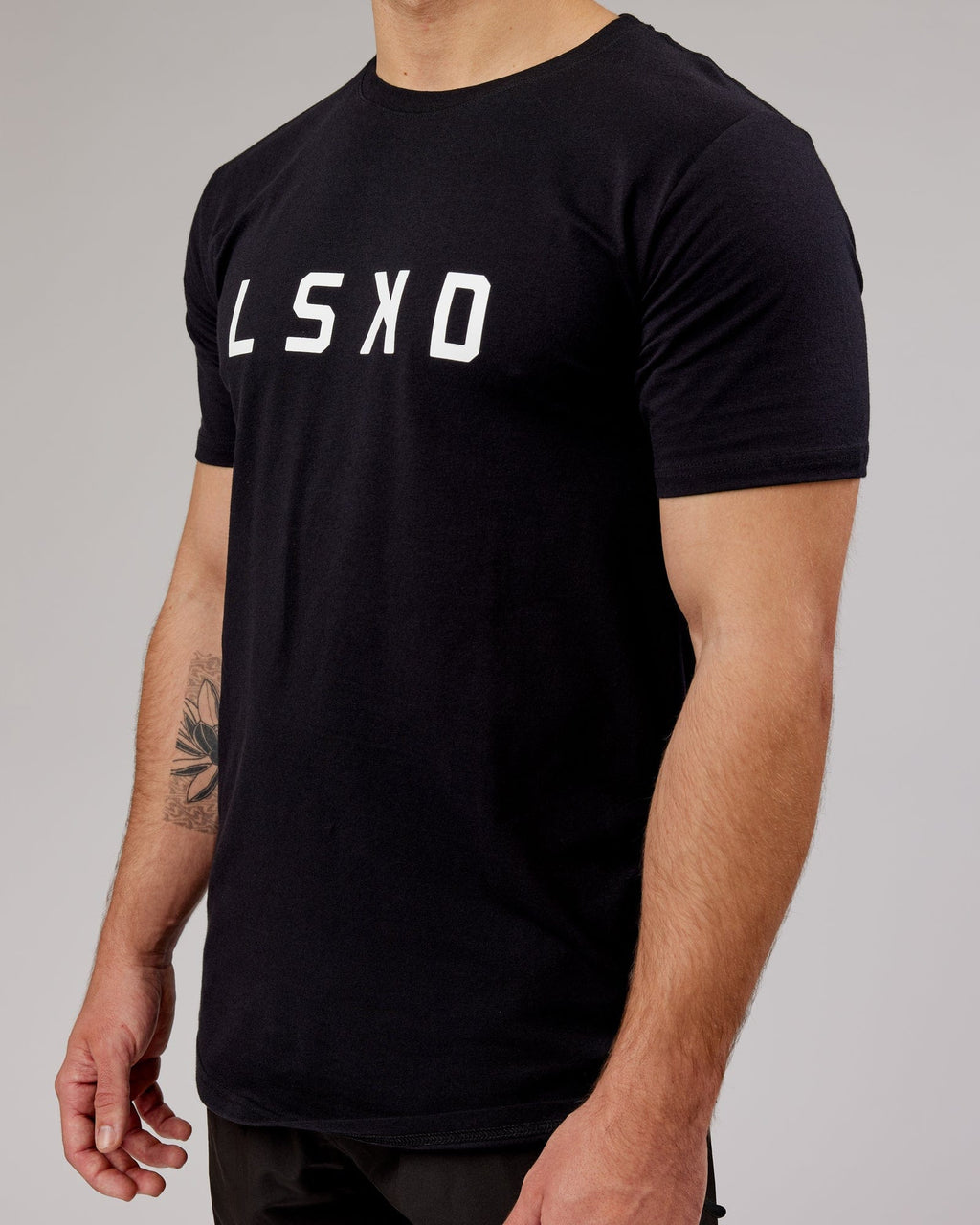 Model wearing Power FLXDRY Performance Tee - Black