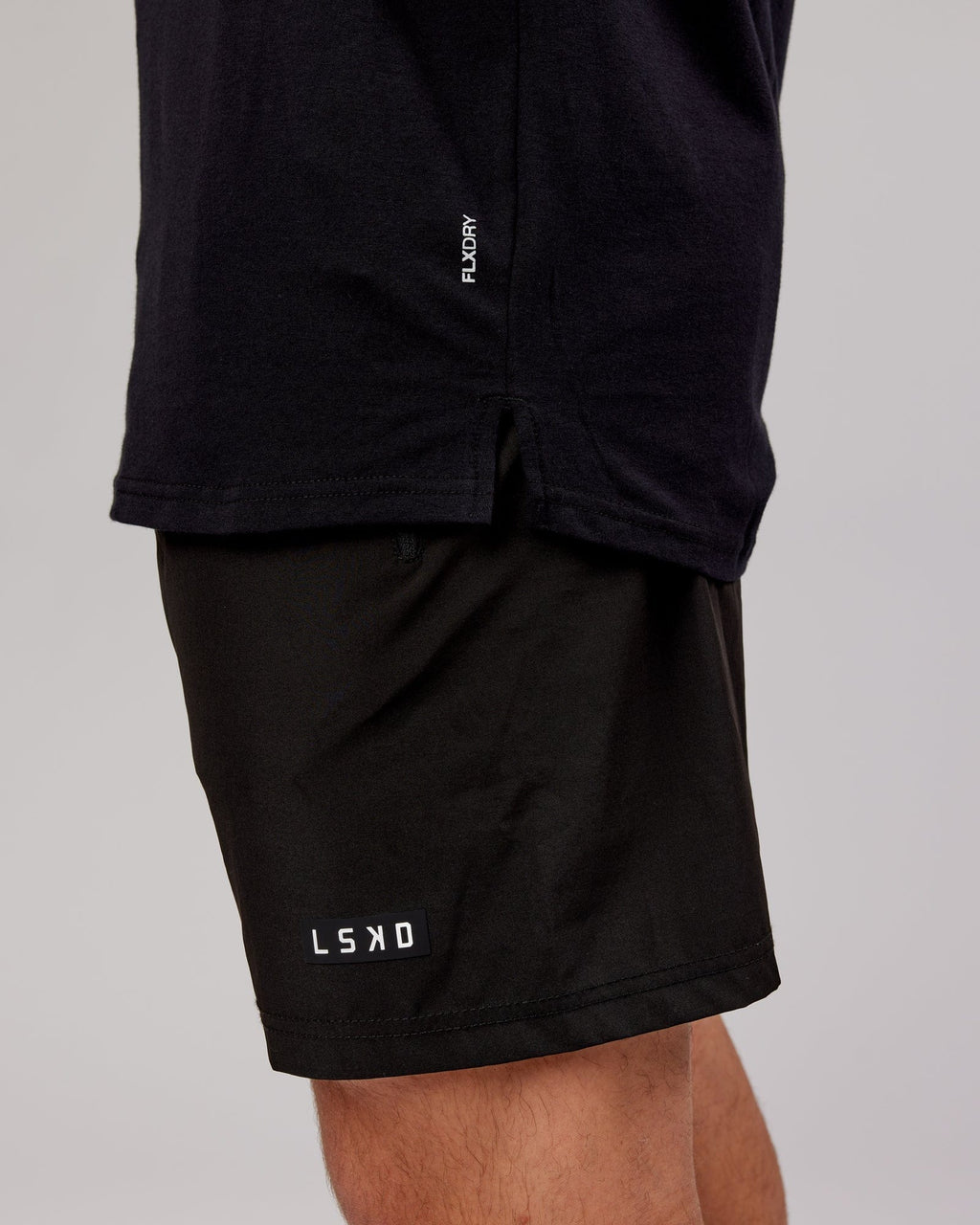 Model wearing Power FLXDRY Performance Tee - Black