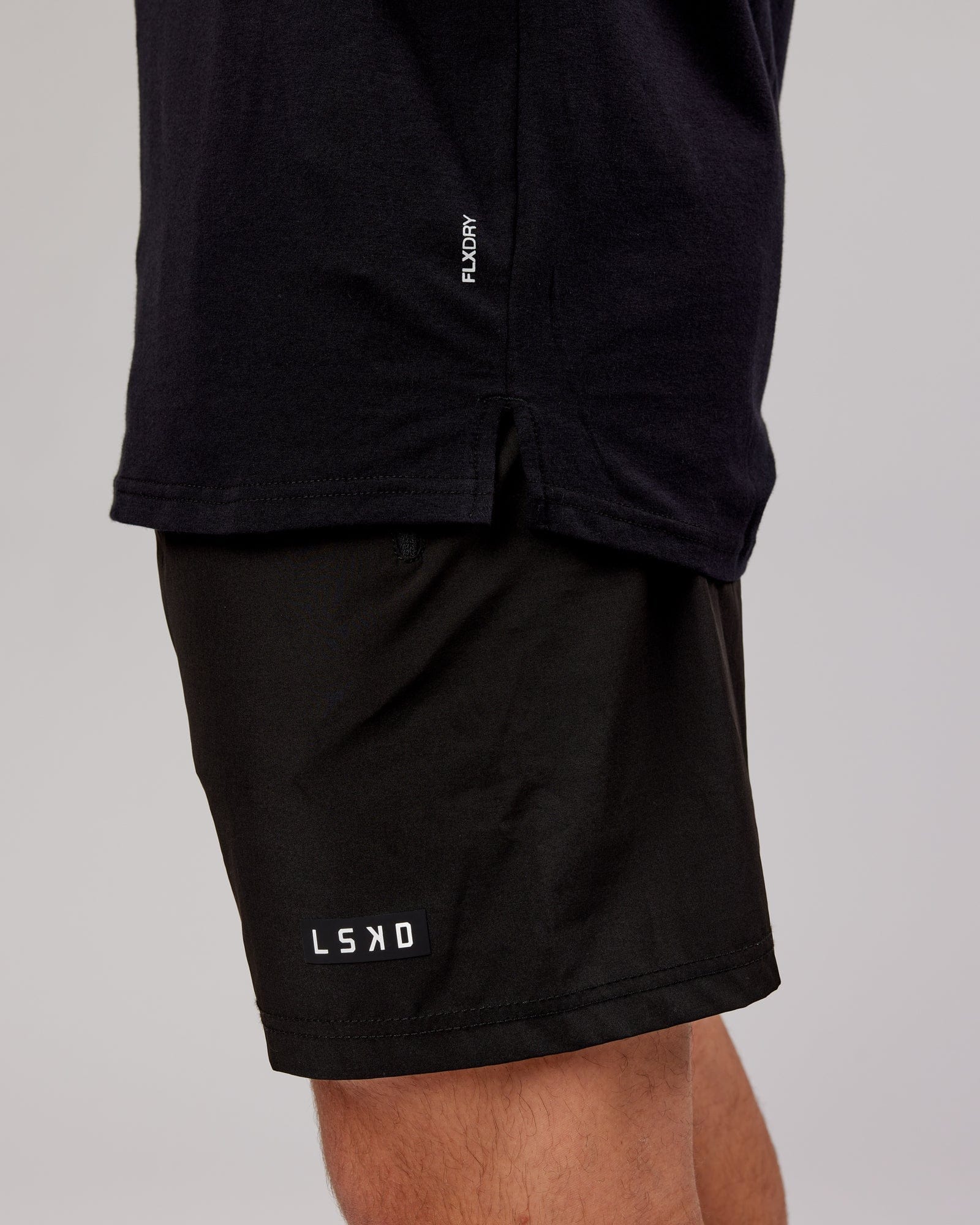 Model wearing Power FLXDRY Performance Tee - Black