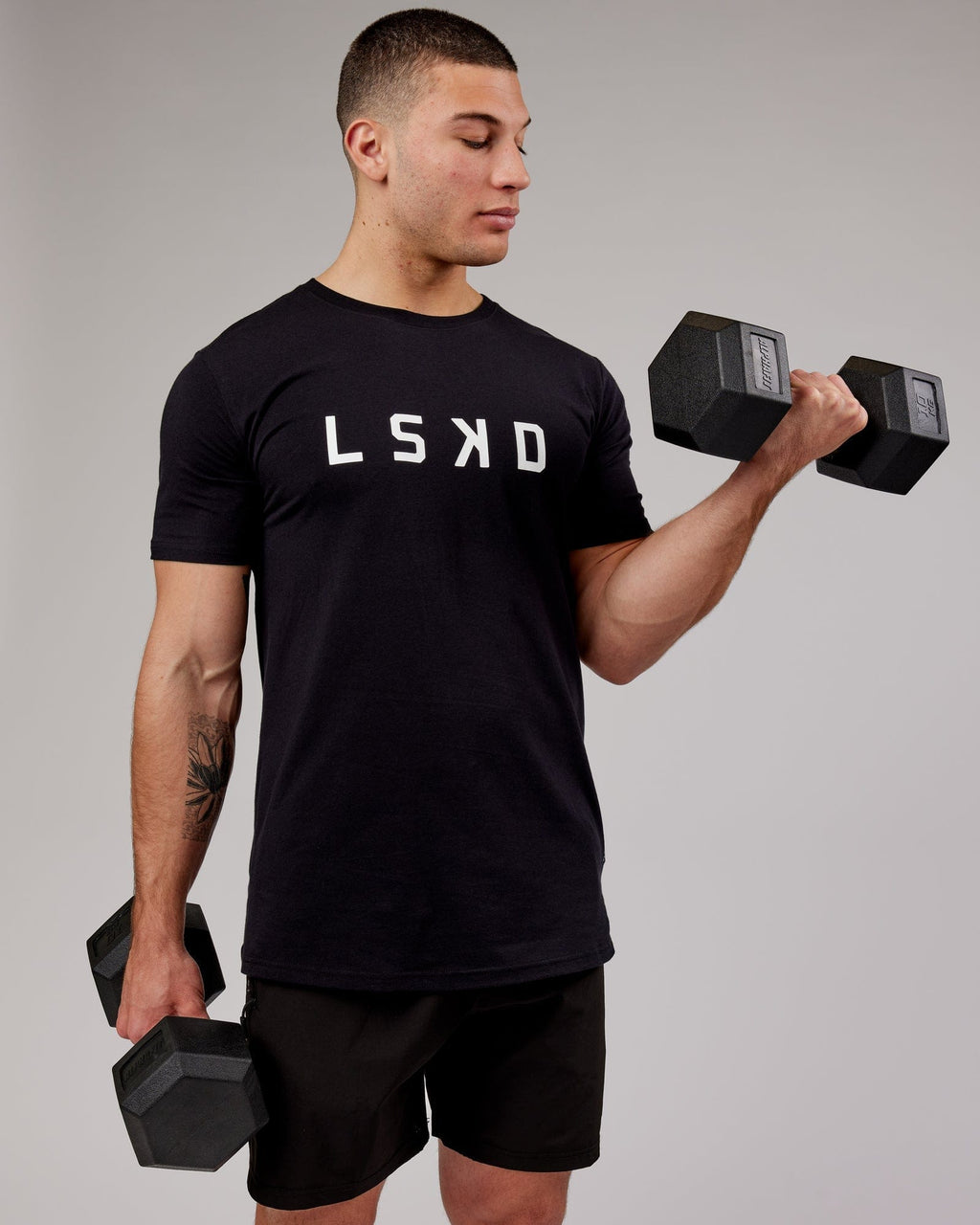 Model wearing Power FLXDRY Performance Tee - Black
