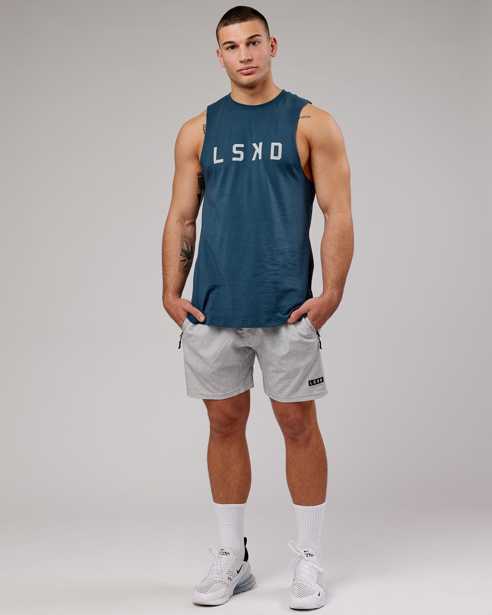 Model wearing Power FLXDRY Training Fit Performance Tank - Light Navy