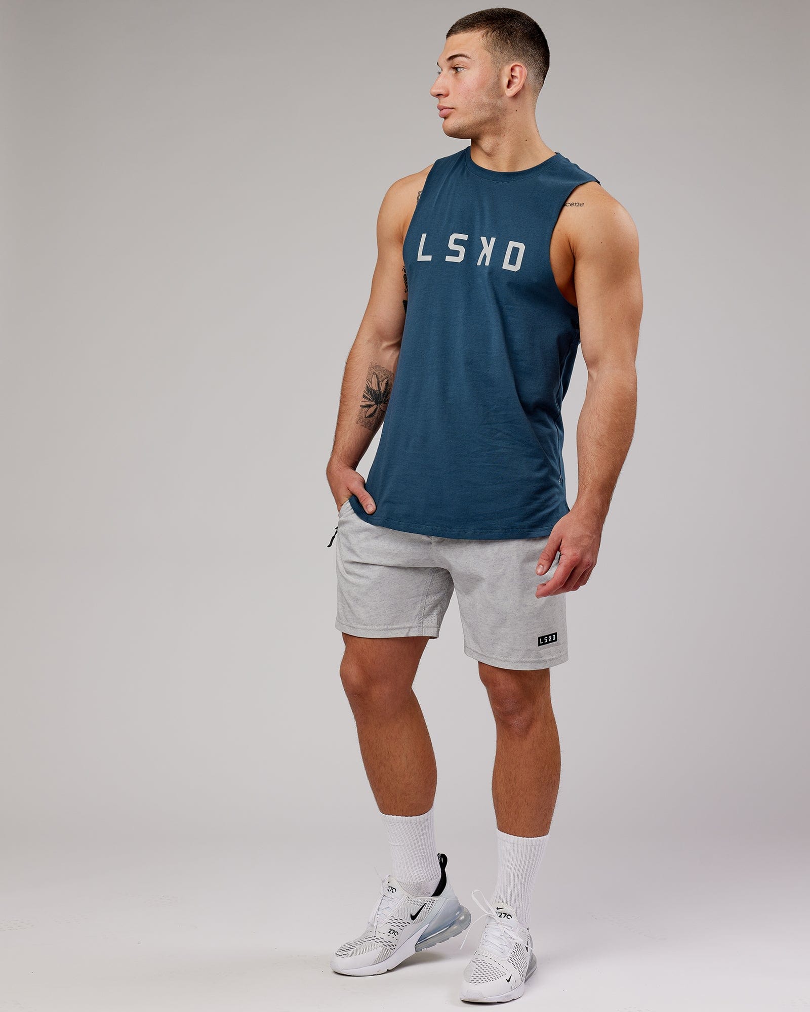 Model wearing Power FLXDRY Training Fit Performance Tank - Light Navy