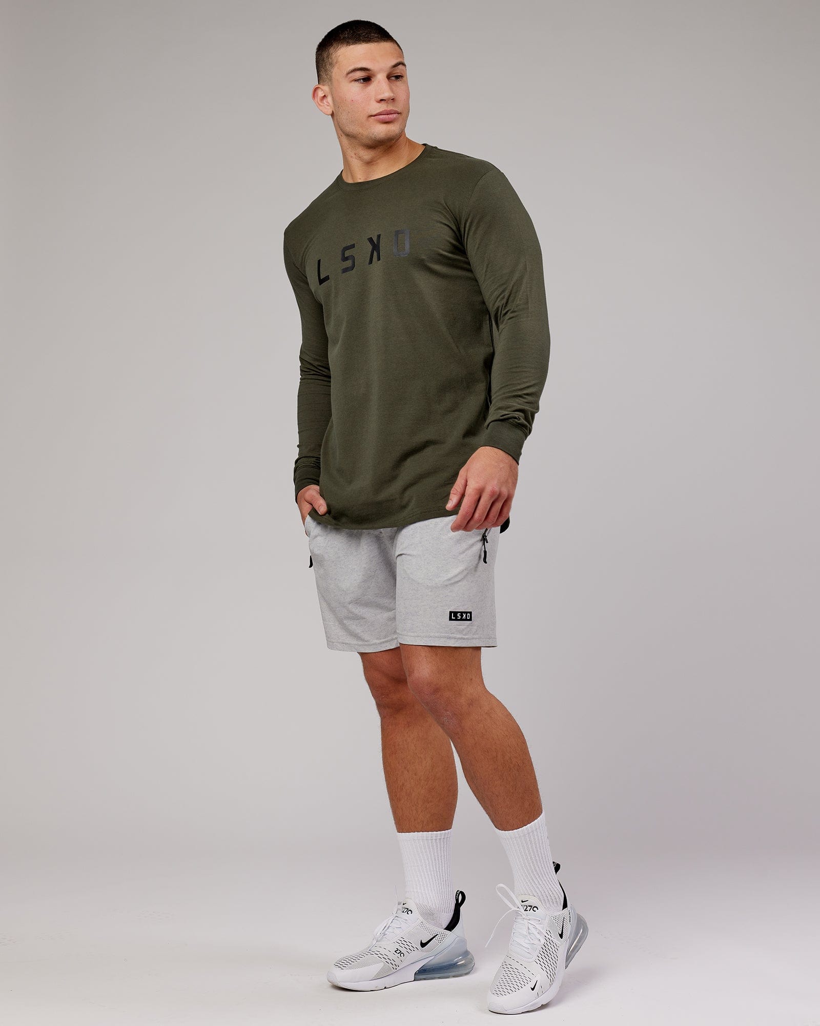 Model wearing Power FLXDRY Performance LS Tee - Forest Night