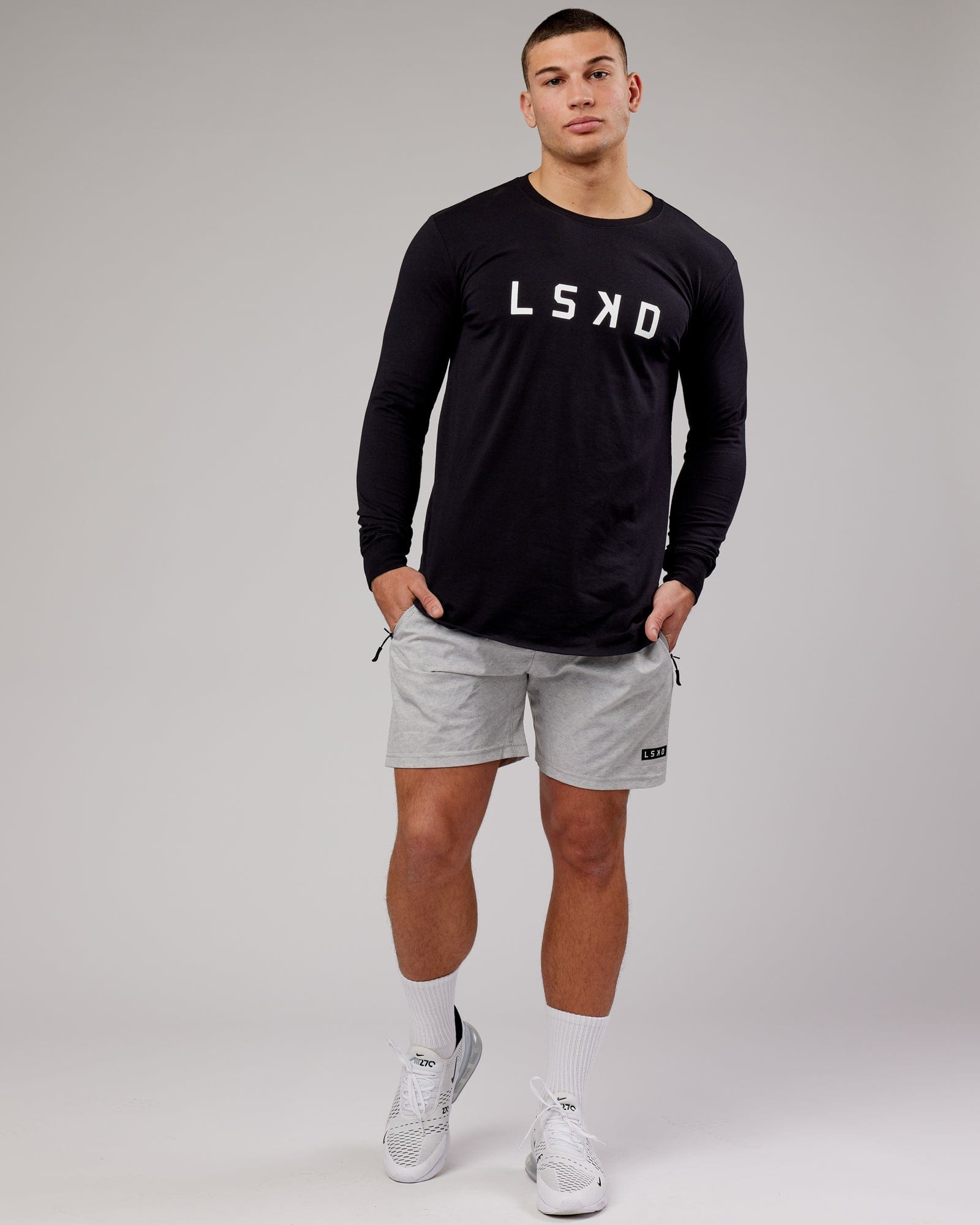 Model wearing Power FLXDRY Performance LS Tee - Black