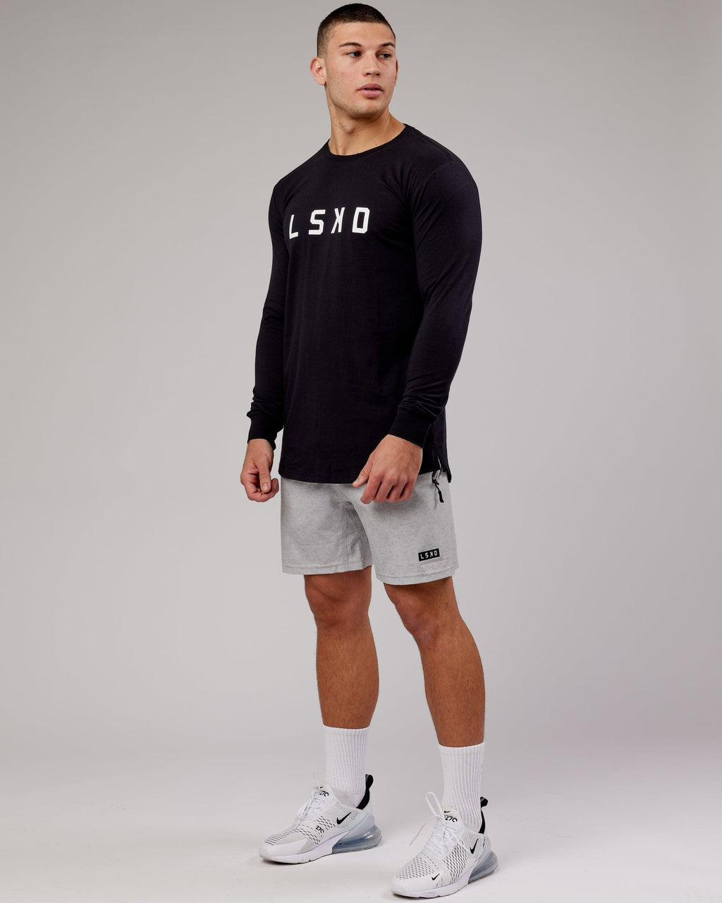 Model wearing Power FLXDRY Performance LS Tee - Black