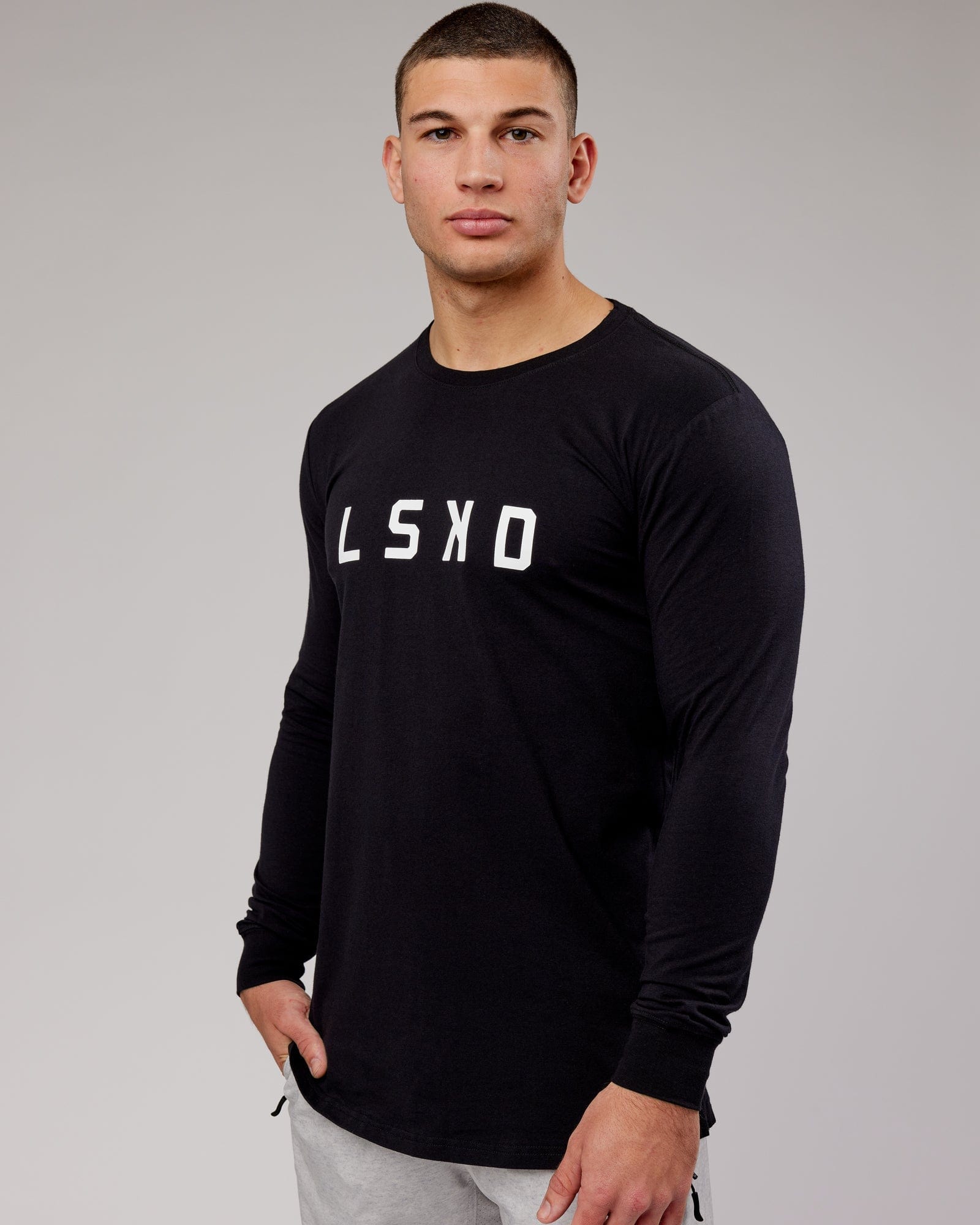 Model wearing Power FLXDRY Performance LS Tee - Black