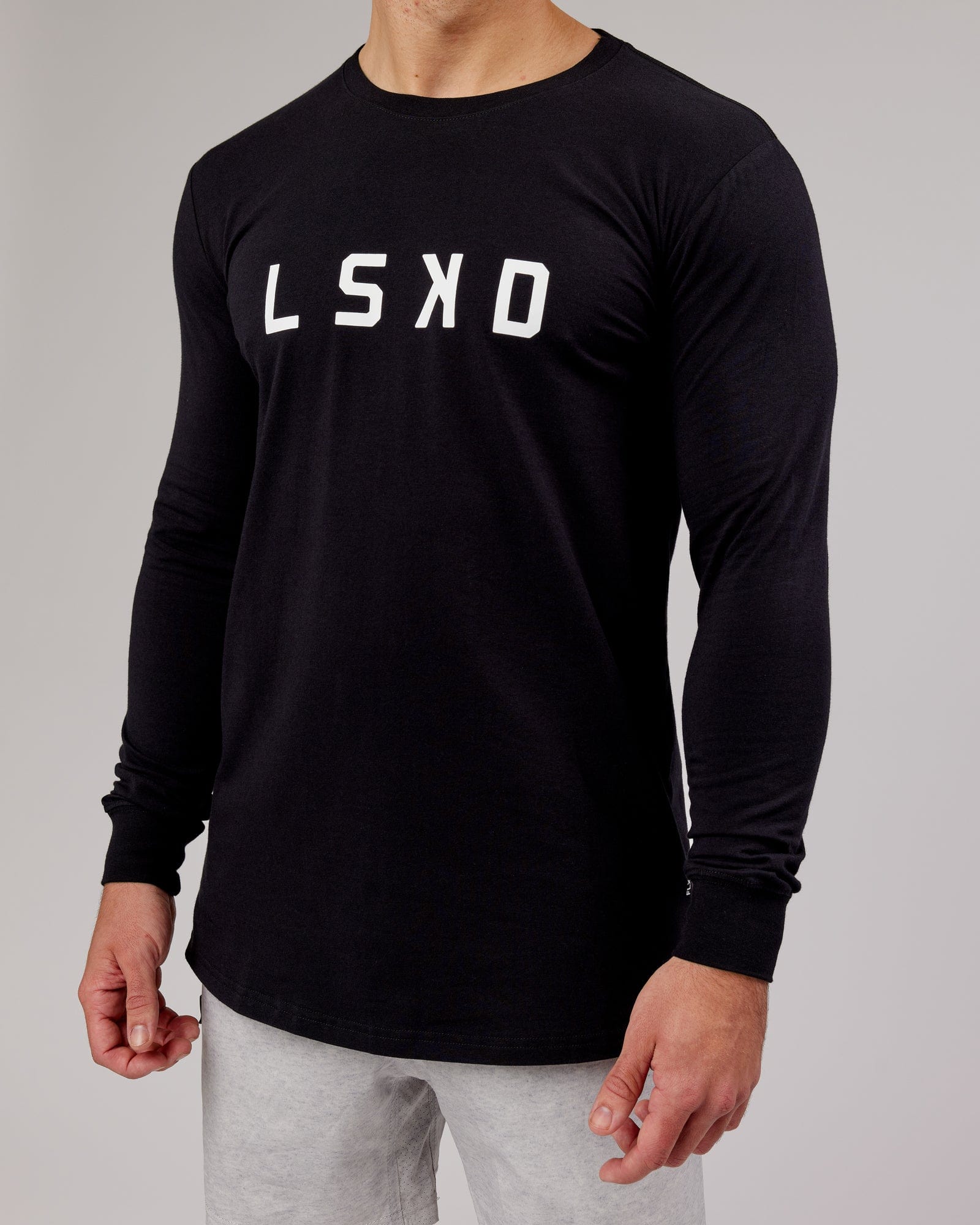 Model wearing Power FLXDRY Performance LS Tee - Black