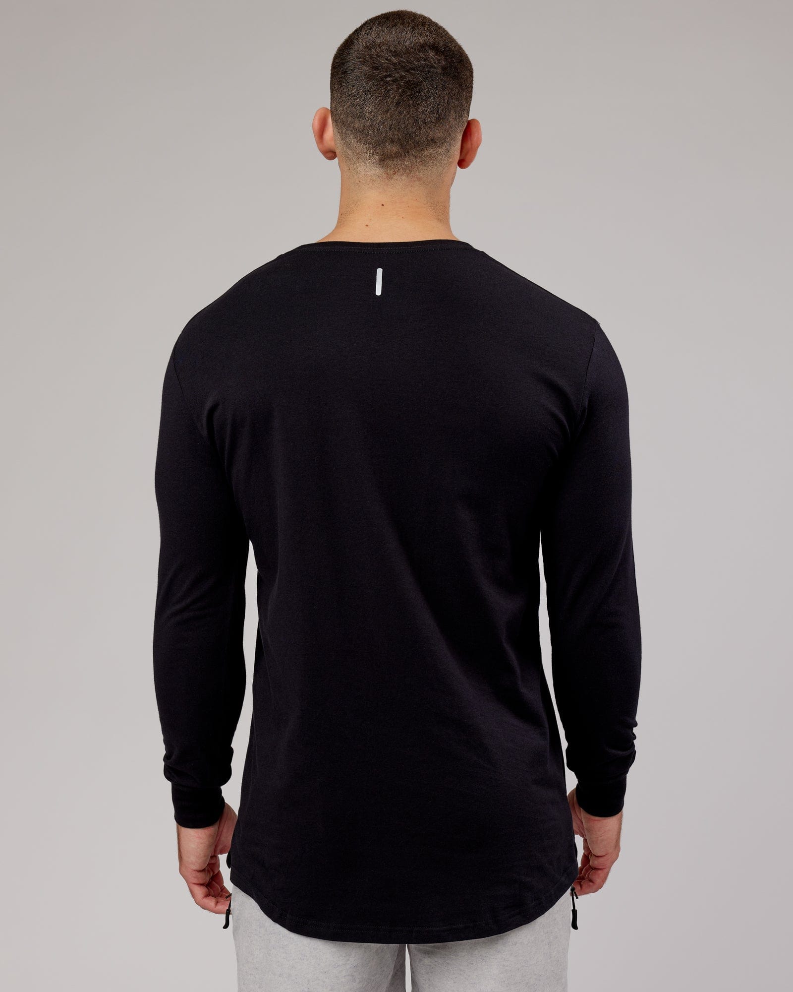 Model wearing Power FLXDRY Performance LS Tee - Black