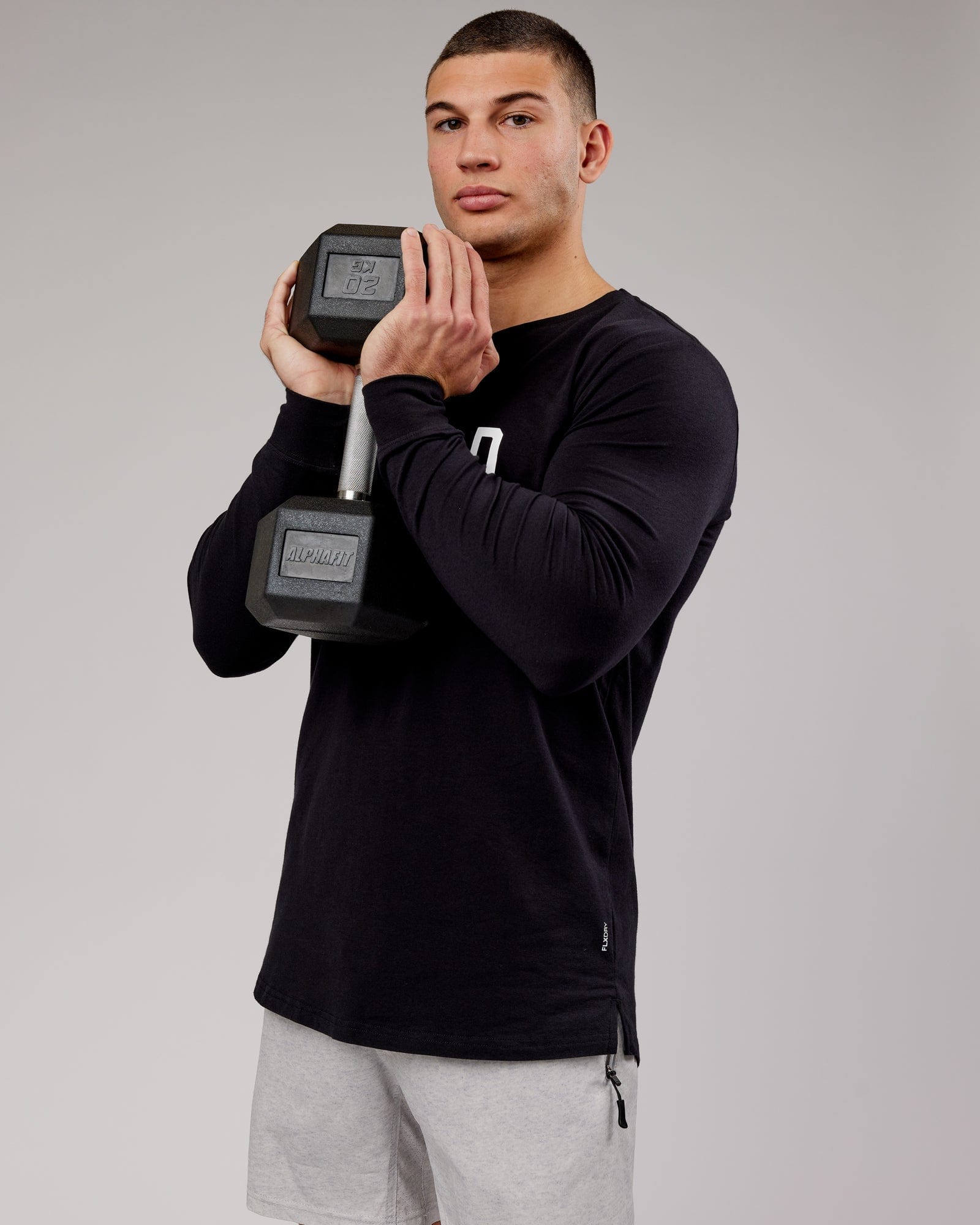 Model wearing Power FLXDRY Performance LS Tee - Black